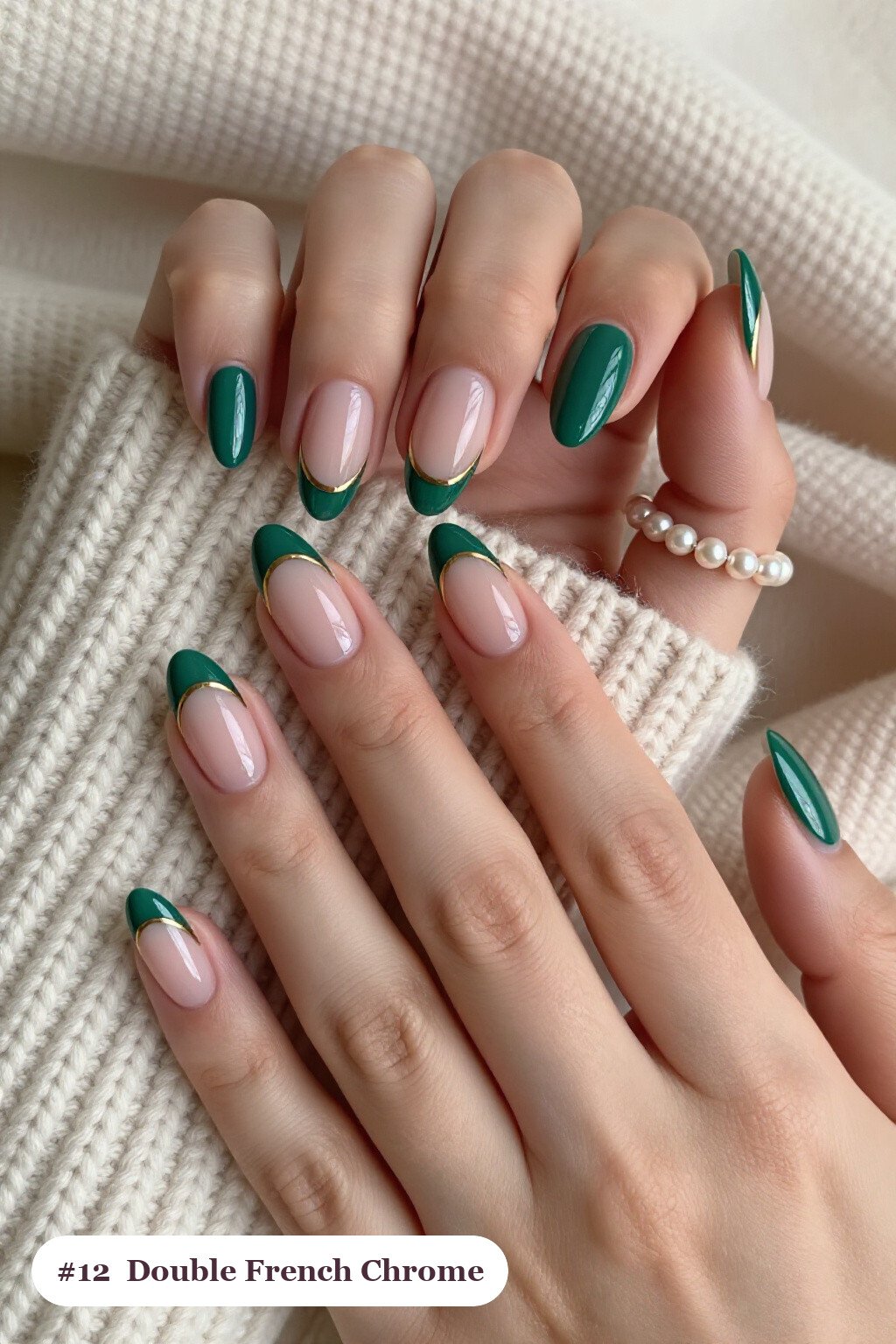 Medium almond emerald chrome nails with a liquid chrome mirror finish clearly visible on every nail, styled with double-line french tips in two colours, with gold details - emerald chrome almond nails