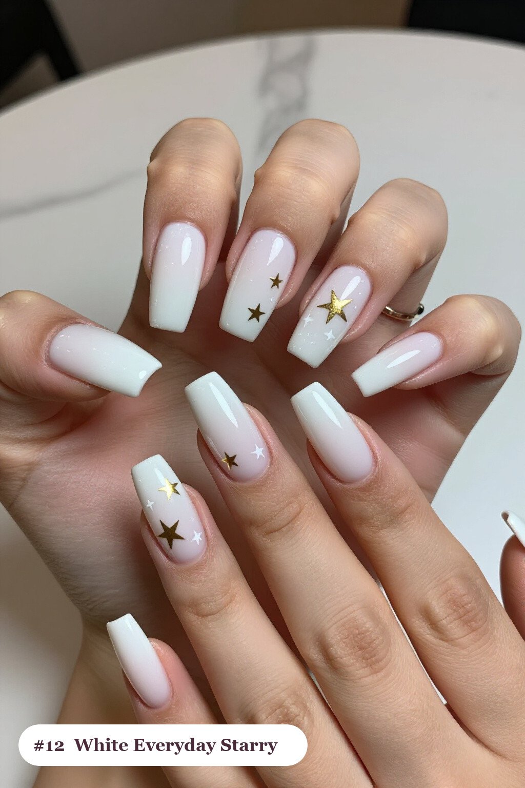 Long Square Milky White Nails with White and Gold Star Sparkles - everyday nail designs Long Square Milky White Nails with White and Gold Star Sparkles - everyday nail designs