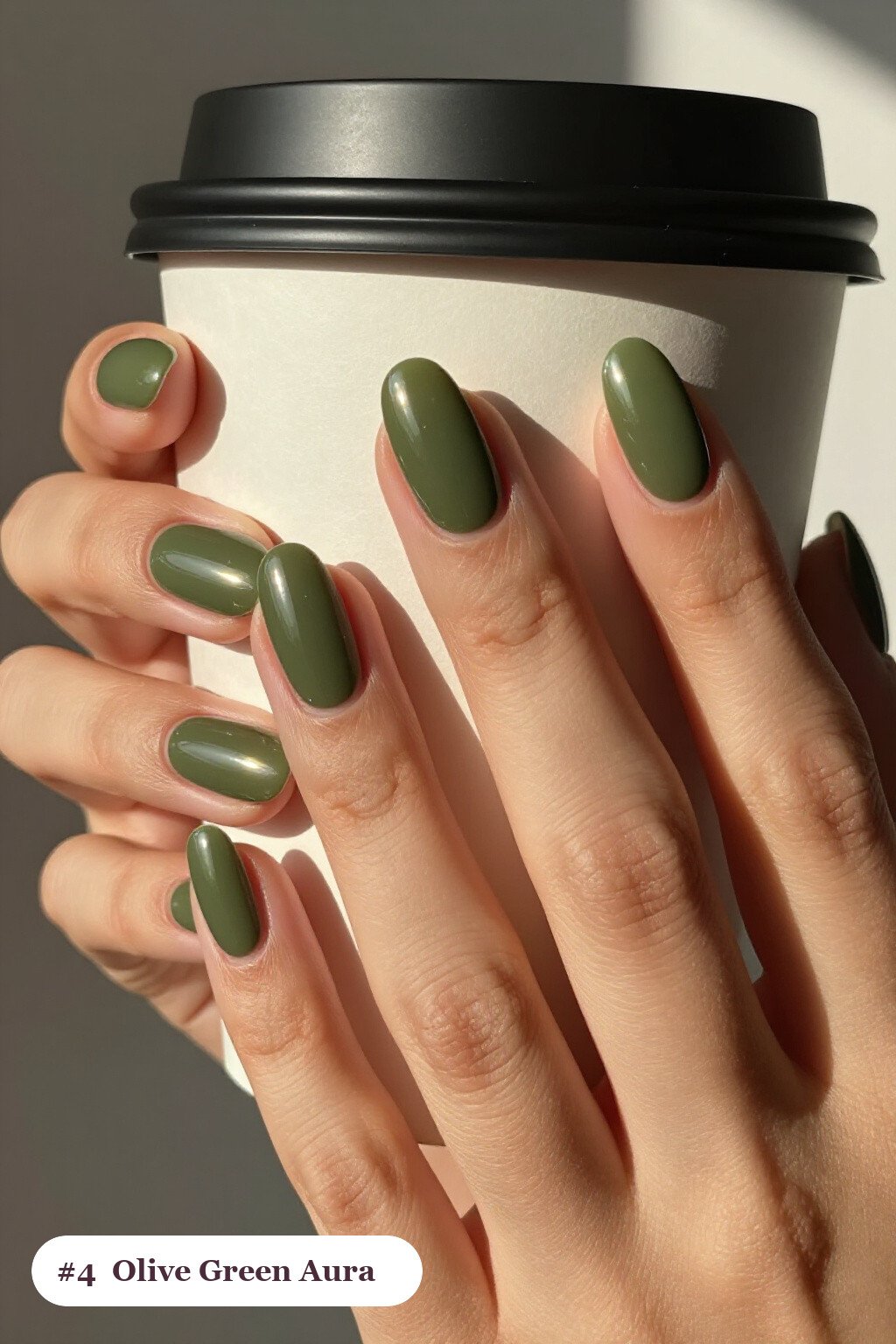 Medium almond olive green nails with a glowing airbrushed aura in the centre of each nail, perfect for fall - fall almond nails designs