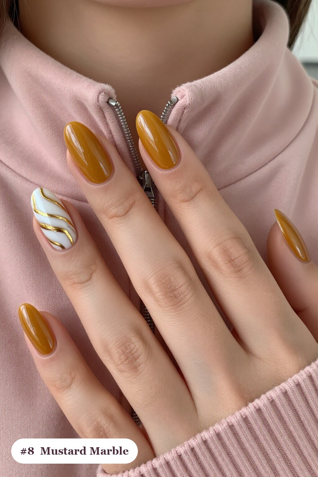Medium almond mustard nails with bold marble veins in white and gold across every nail, perfect for fall - fall almond nails designs