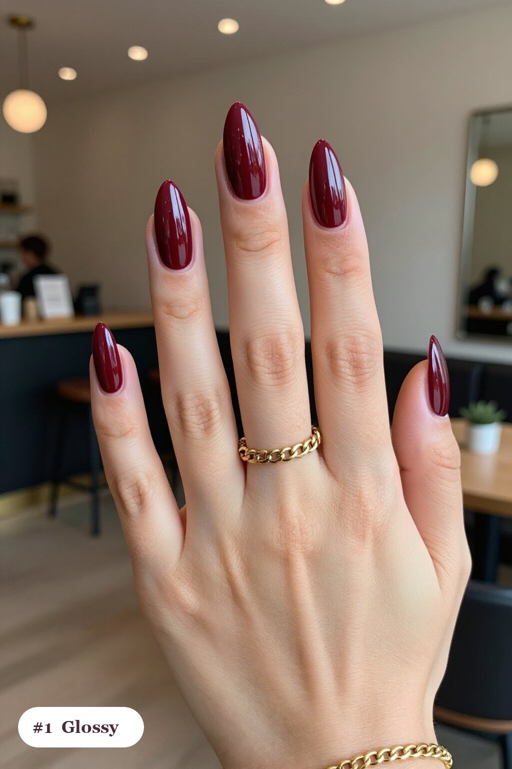 Fall Manicure Ideas: Long Stiletto Burgundy Mirror‑Gloss Finish - fall manicure ideas