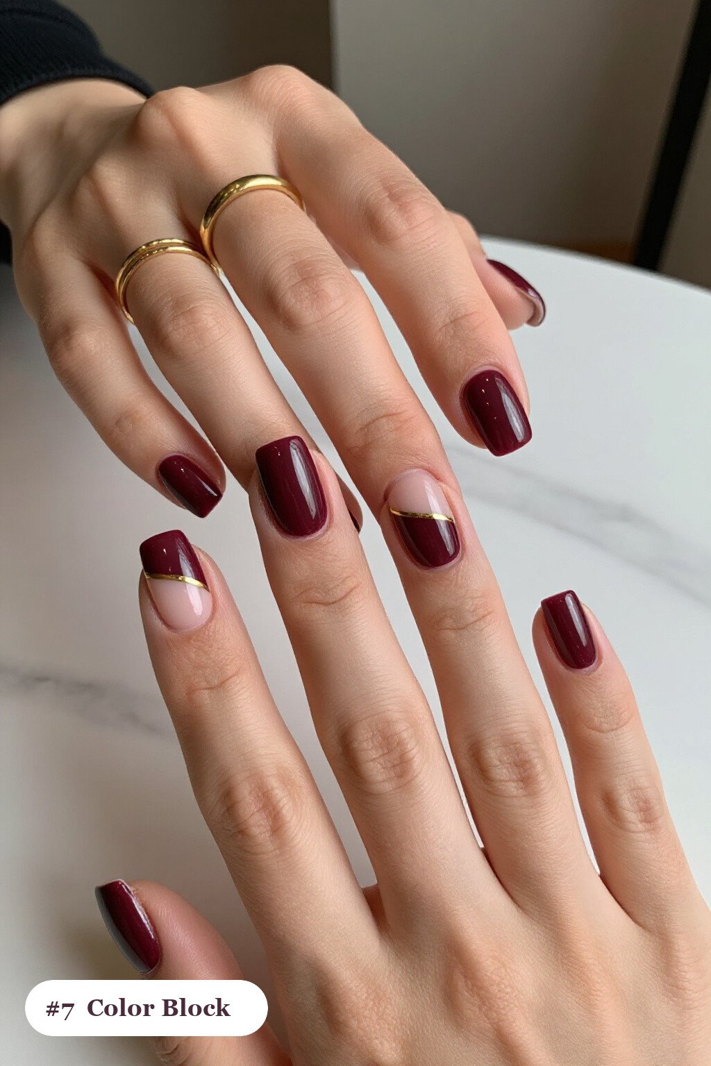 Burgundy Medium Square Colour‑Block Nails with Gold Diagonal Line - fall manicure ideas