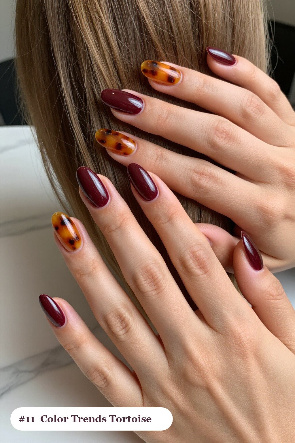 Medium Almond Burgundy Nails with Glossy Amber Tortoiseshell Accents - fall nail color trends
