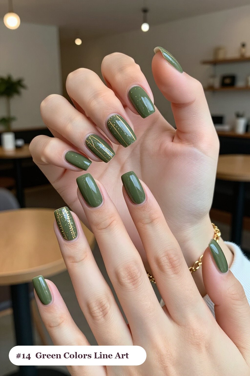 Long square olive green colors nails with fine gold line art and tiny dots drawn across every nail, perfect for fall - fall nail colors