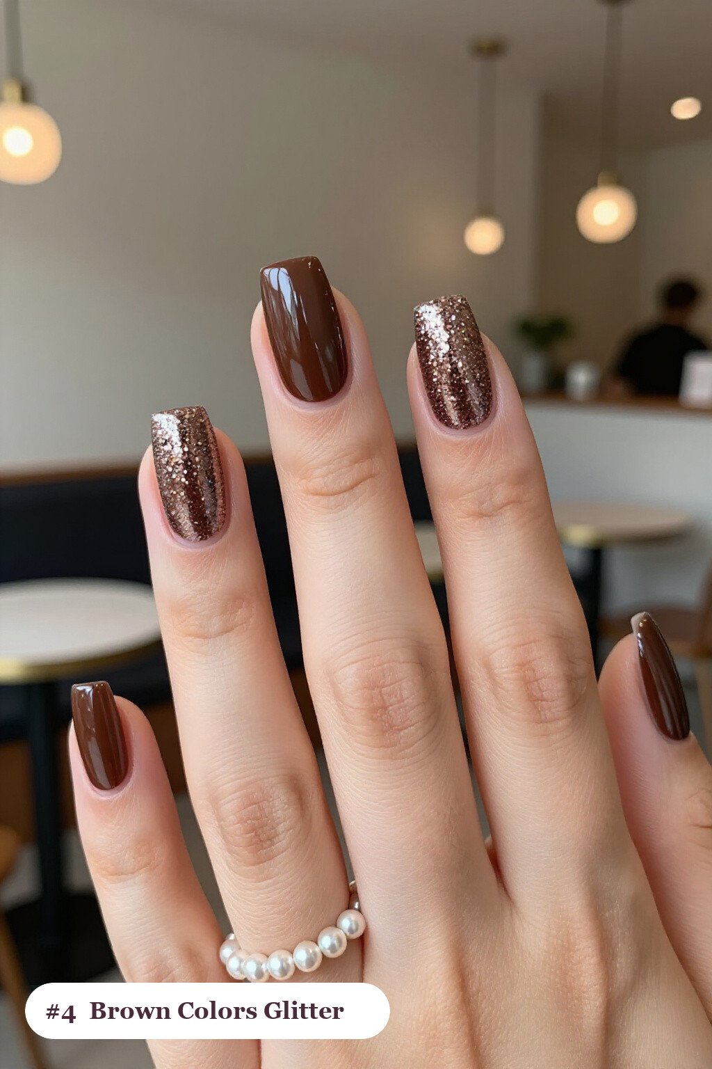 Long square chocolate brown colors nails with a sparkling glitter gradient rising from the cuticle, perfect for fall - fall nail colors