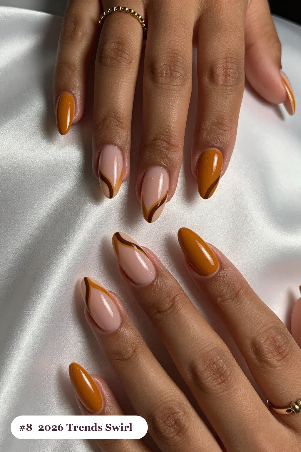 Mustard Coffin Nails Hand‑Painted with Bold Swirl Lines in Contrasting Color - fall nails 2026 trends