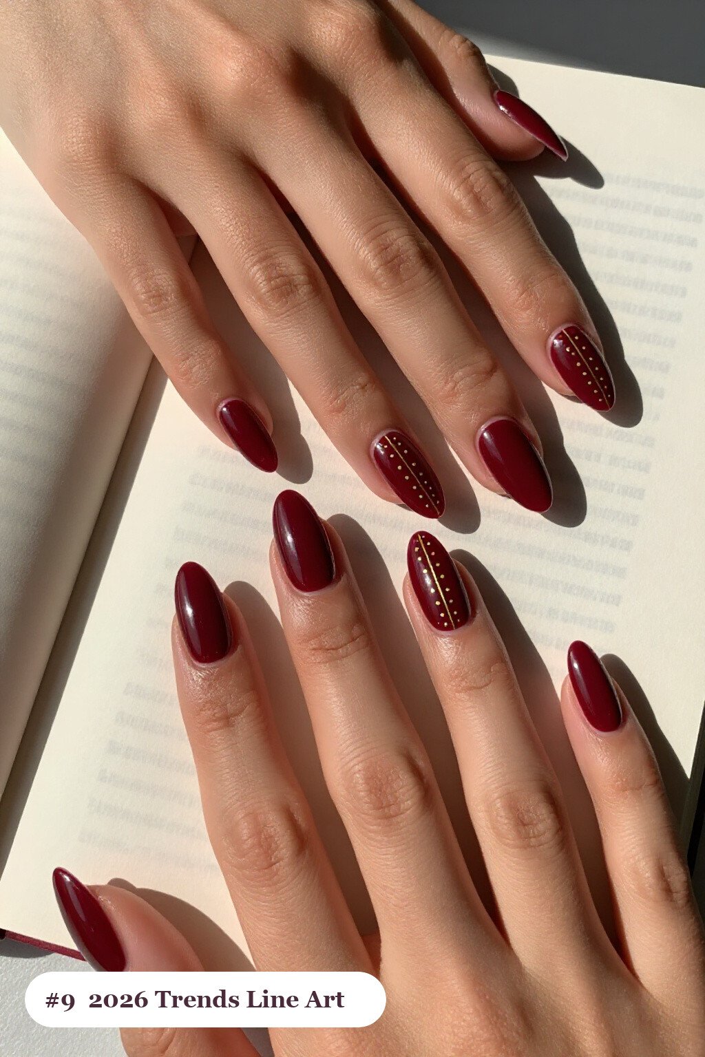 Burgundy Ballerina Nails Adorned with Fine Gold Line Art and Tiny Dots - fall nails 2026 trends