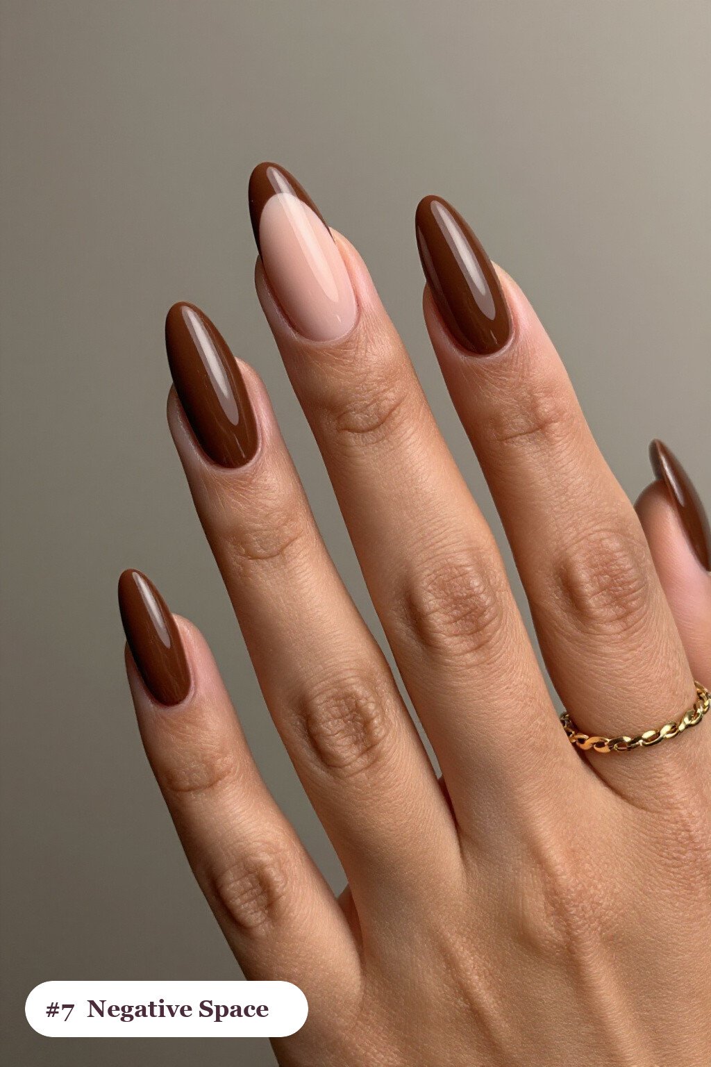 Long ballerina chocolate brown nails in a negative-space design with sheer nude windows and bold colour shapes, perfect for fall - fall nails cute