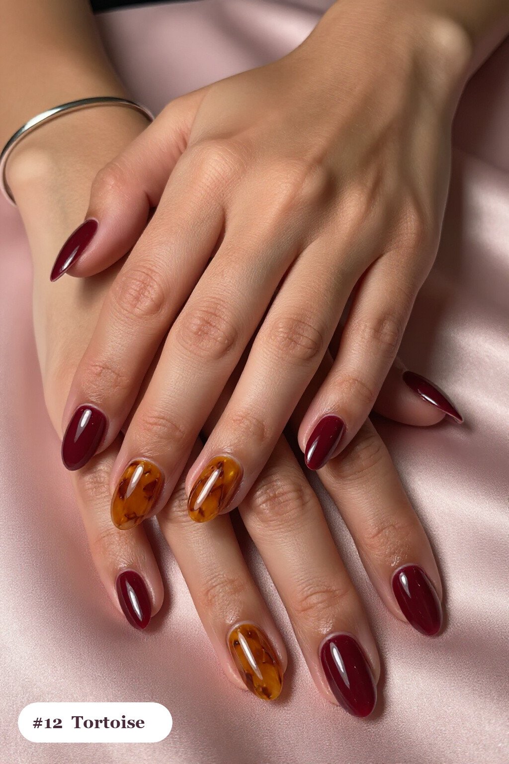 Burgundy Medium Oval Nails with Glossy Amber Tortoiseshell Accent on Two Nails - fall nails leaves