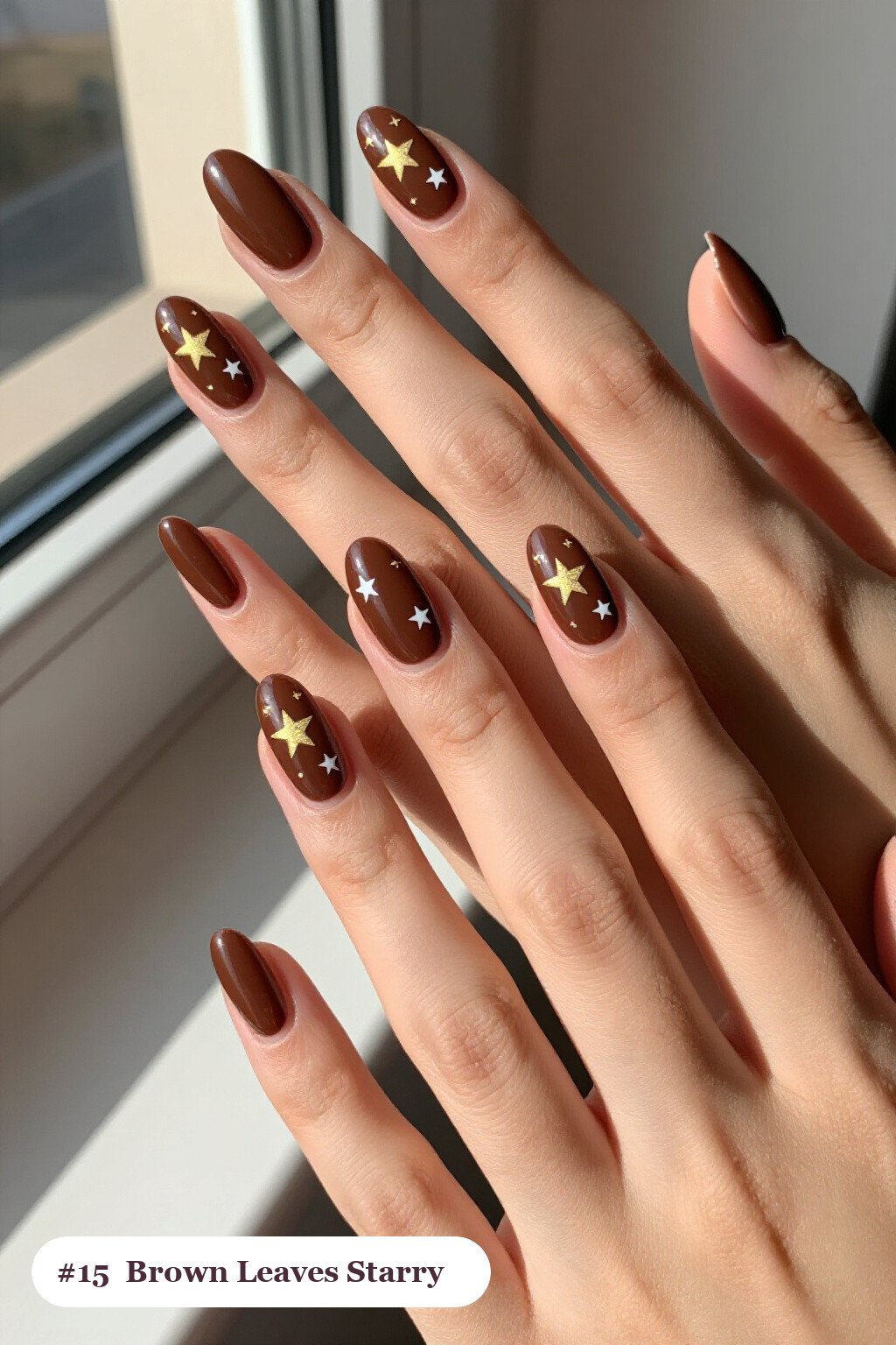 Chocolate Brown Medium Almond Nails Sprinkled with White and Gold Stars & Sparkles - fall nails leaves