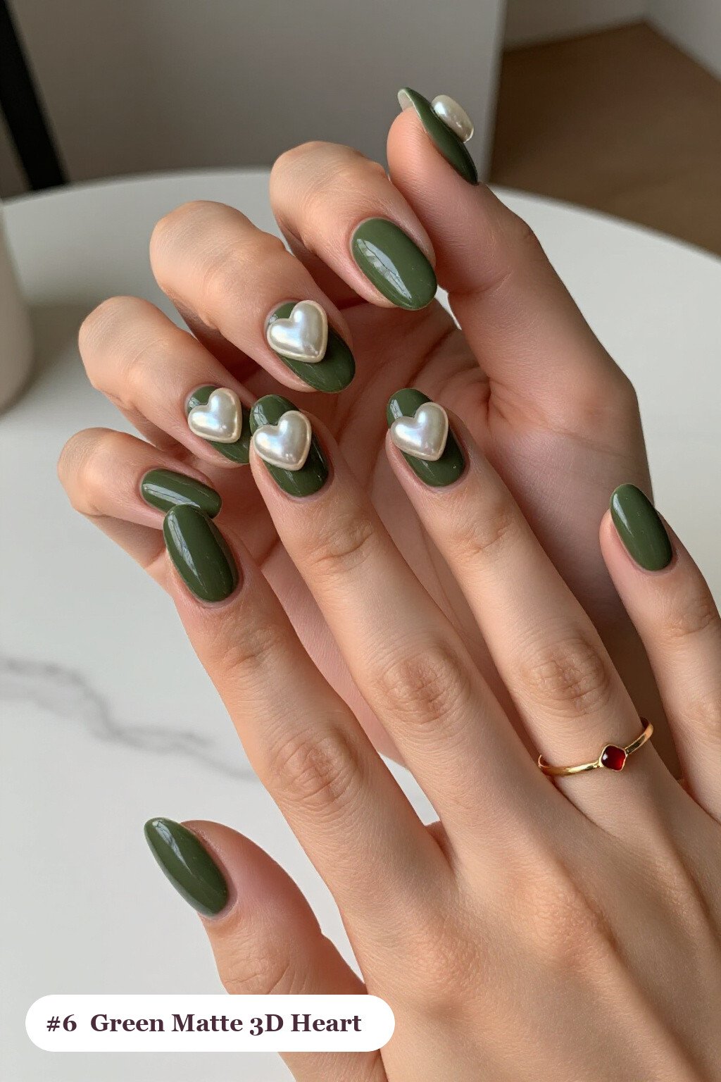Medium Oval Olive Green Matte Nails Adorned with Chunky 3D Gel Hearts and Pearls - fall nails matte