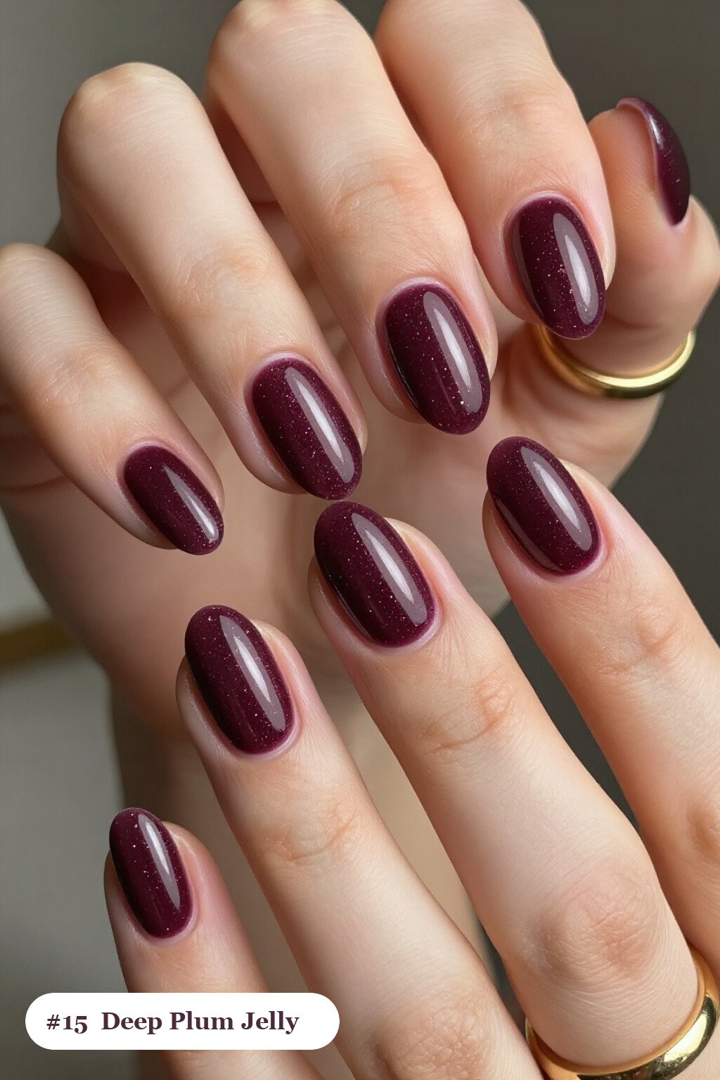 Short almond deep plum nails in a see-through jelly finish with encapsulated glitter, perfect for fall - fall nails short