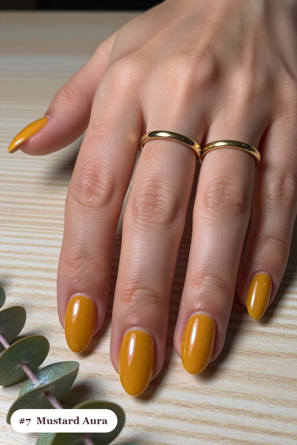 Short almond mustard nails with a glowing airbrushed aura in the centre of each nail, perfect for fall - fall nails short