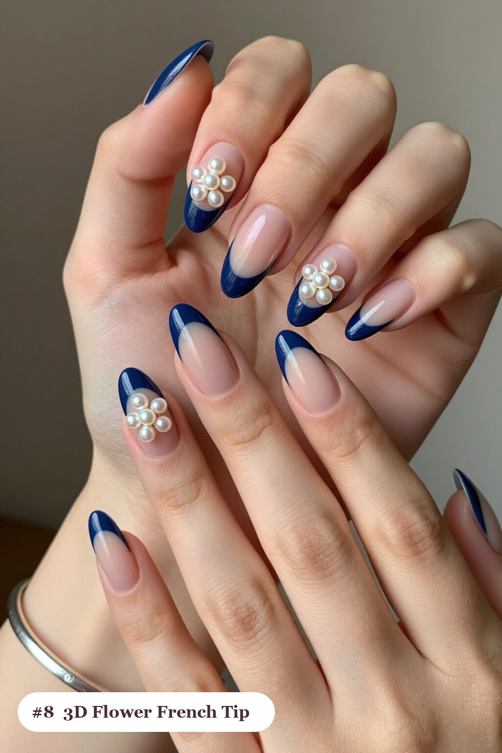 Navy Blue French Tip Almond Nails with 3D Pearl‑Center Flowers - french tip almond nails with design