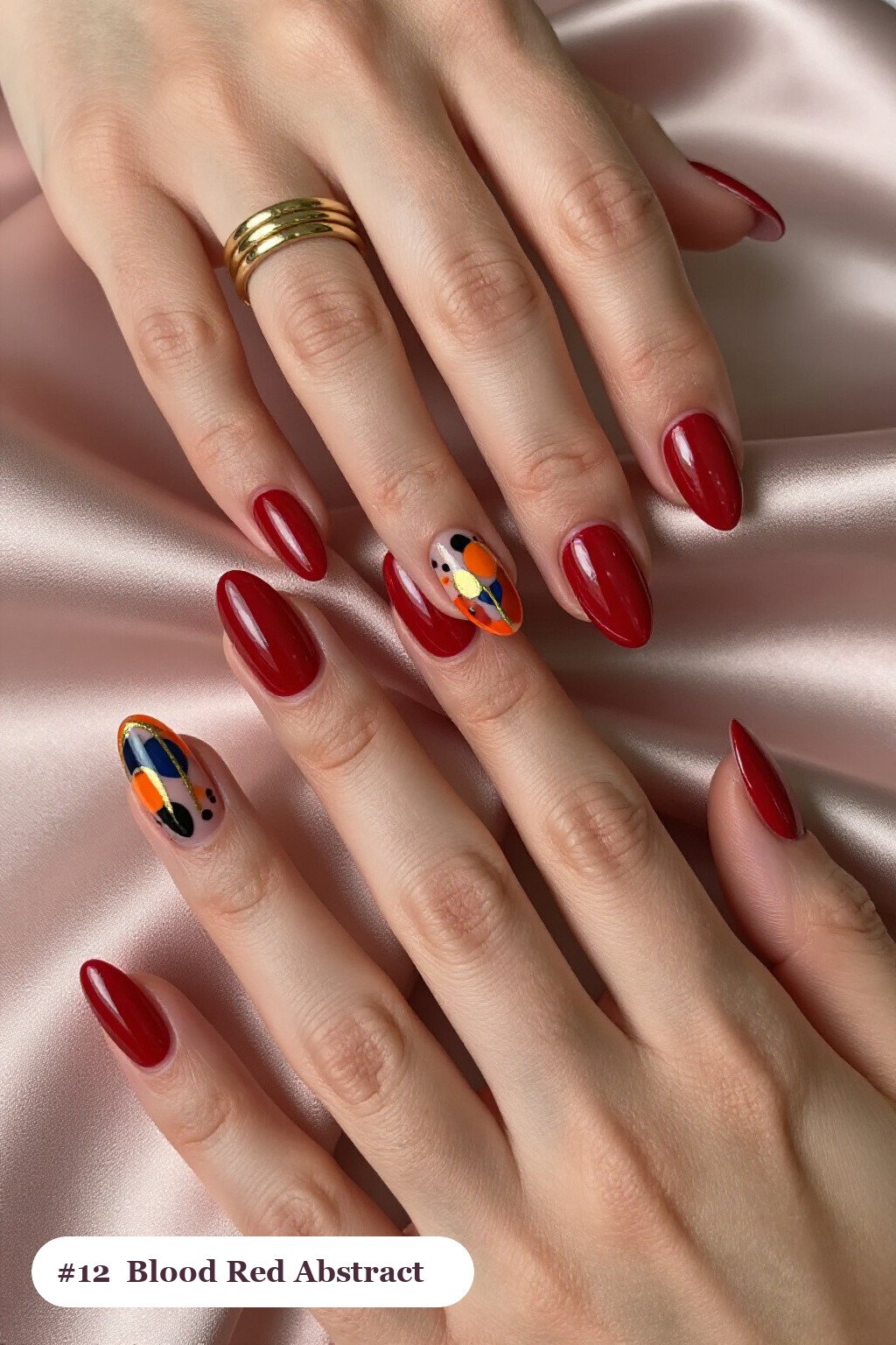 Medium almond blood red nails with abstract art of colour blobs, gold outlines and dots, perfect for halloween - halloween almond nails