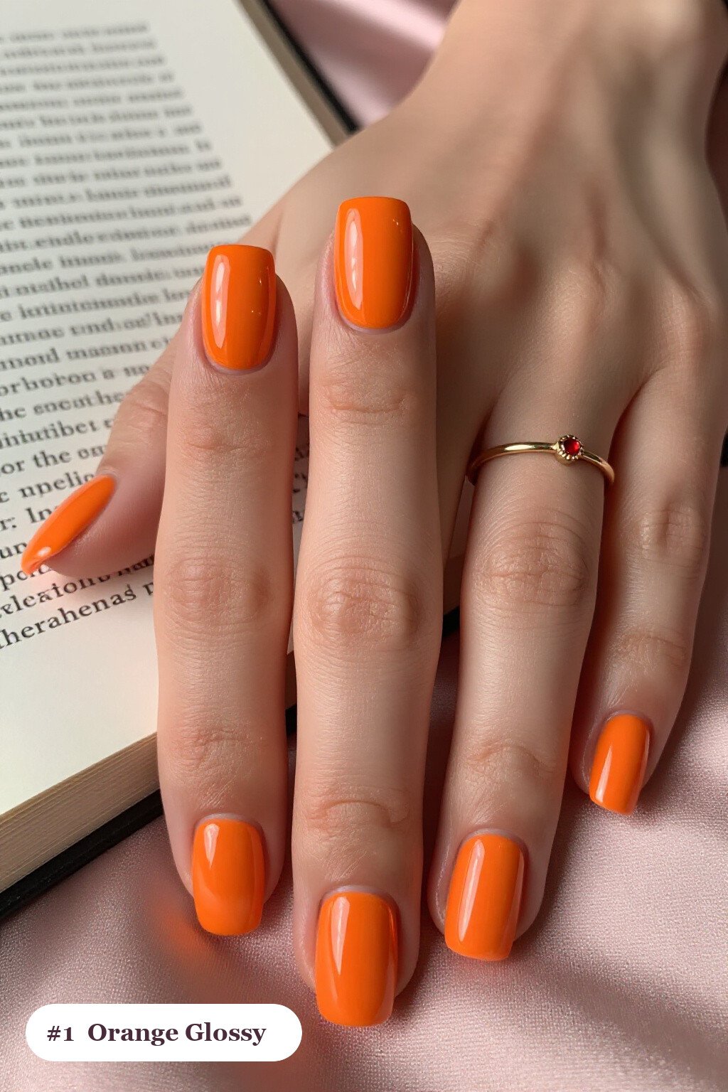 Short square orange nails in a flawless mirror-glossy full-colour finish, perfect for halloween - halloween nails