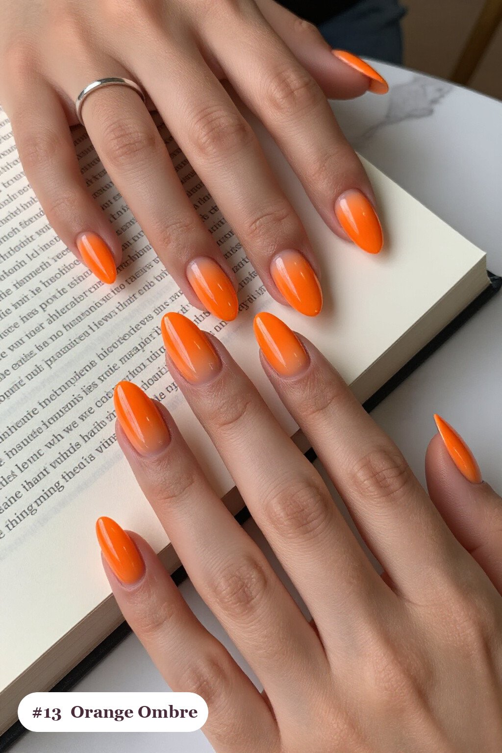 Medium almond orange nails with a vivid two-colour ombre melting from the cuticle to the tips, perfect for halloween - halloween nails