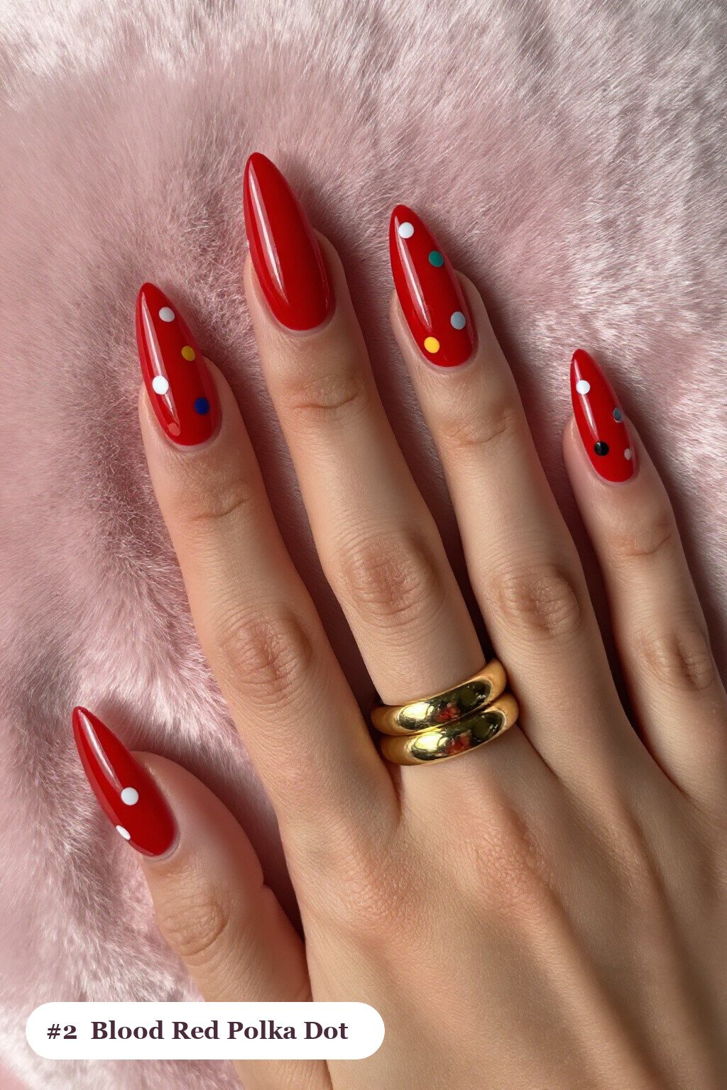 Long stiletto blood red nails with playful polka dots in two colours on alternating nails, perfect for halloween - halloween nails