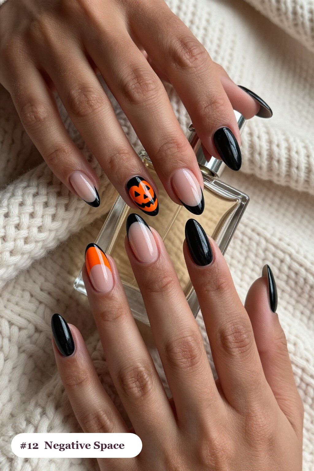 Black Medium Almonds in Negative‑Space Nude Windows and Bold Colour Shapes - halloween nails 2026 trends