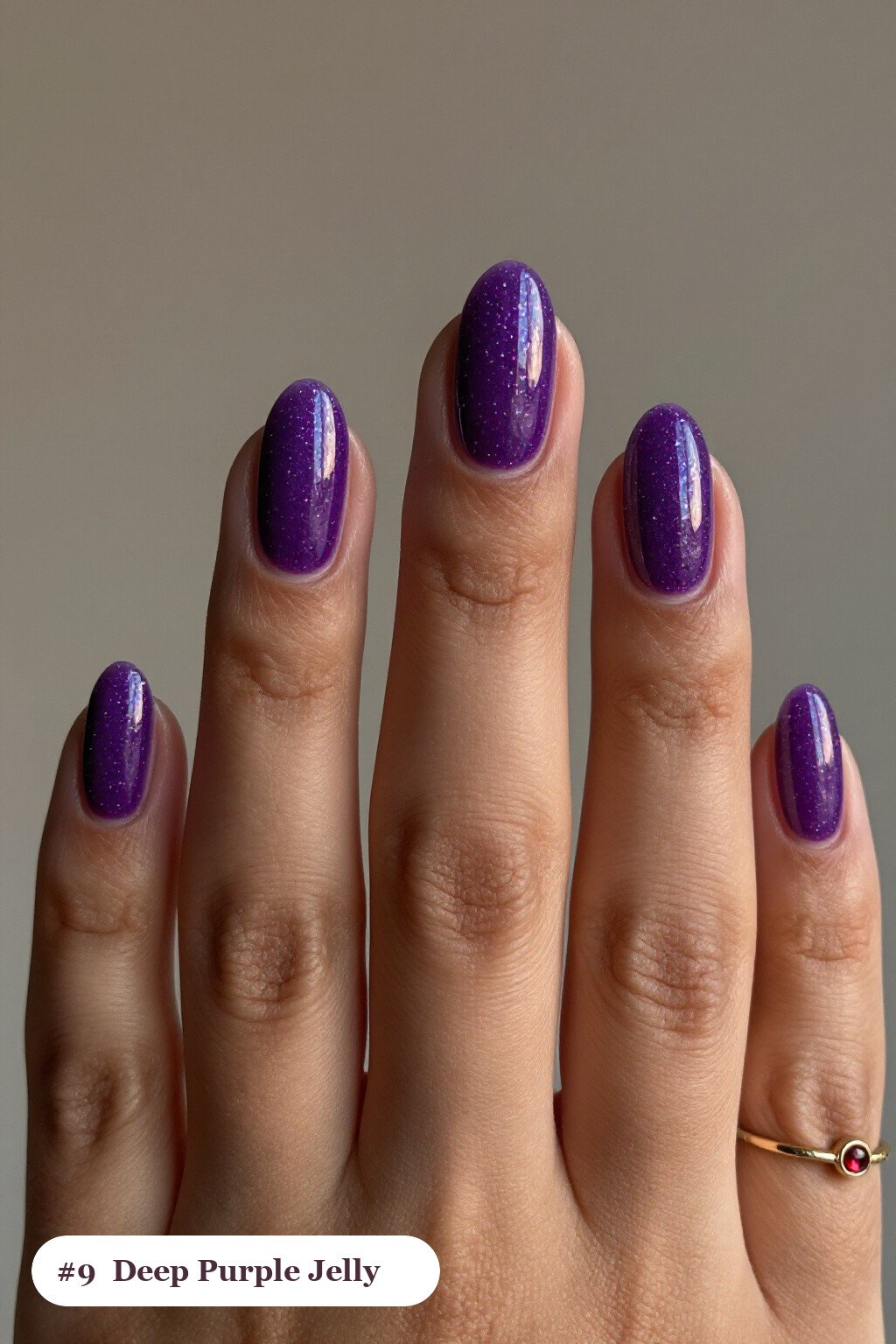 Medium coffin deep purple nails in a see-through jelly finish with encapsulated glitter, perfect for halloween - halloween nails