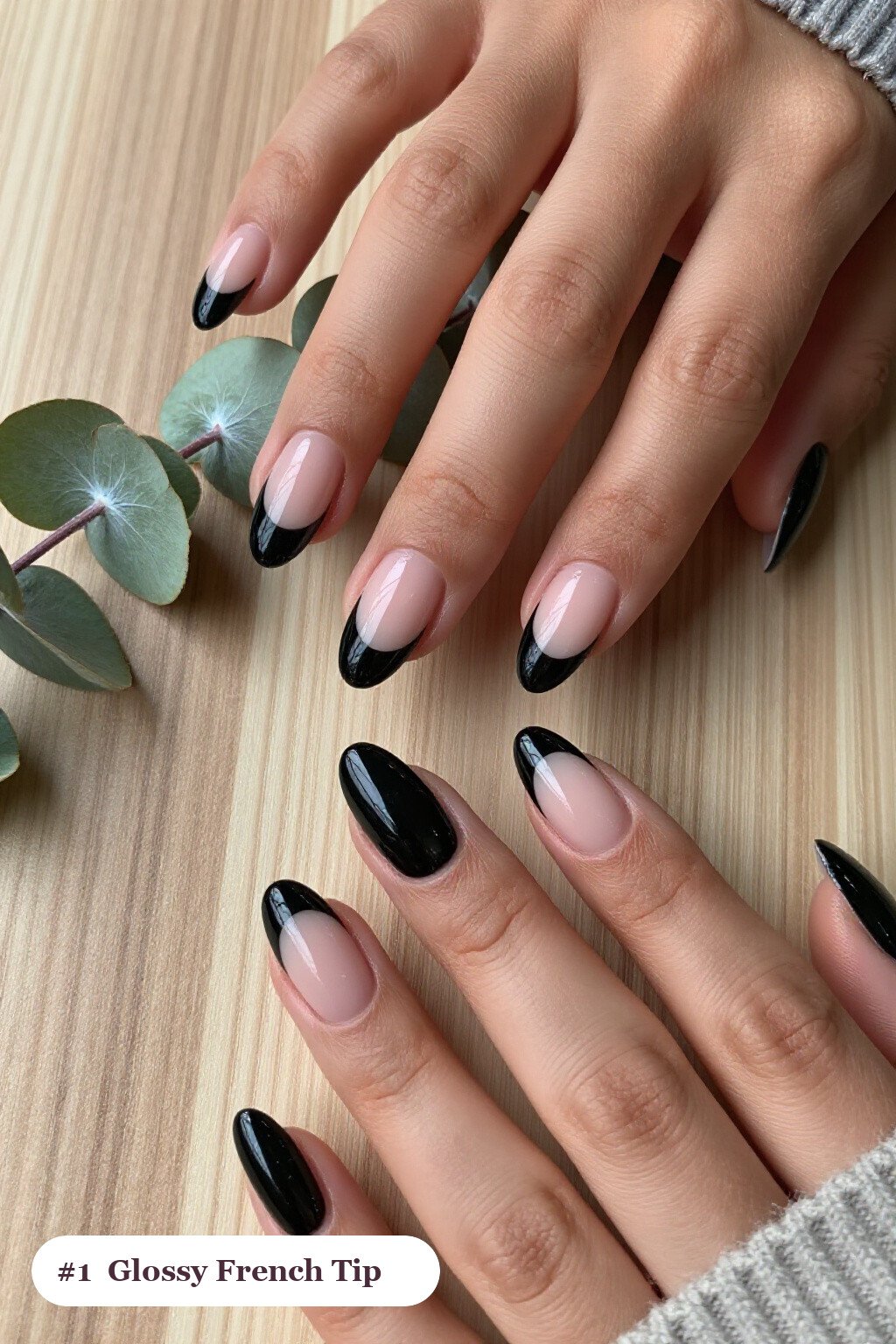 Halloween Nails French Tip: Sleek Medium Almond Black with Glossy Finish - halloween nails french tip