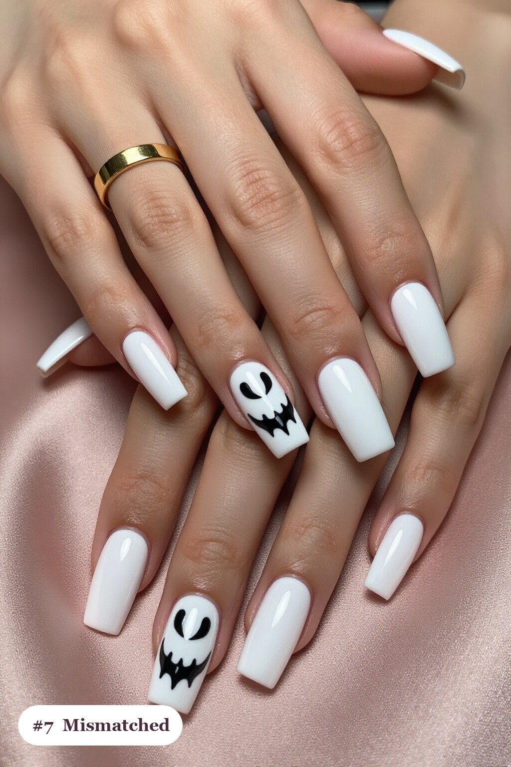 Long square bone white charms nails as a mismatched set where every nail has a different pattern in the same colour story, perfect for halloween - halloween nails with charms