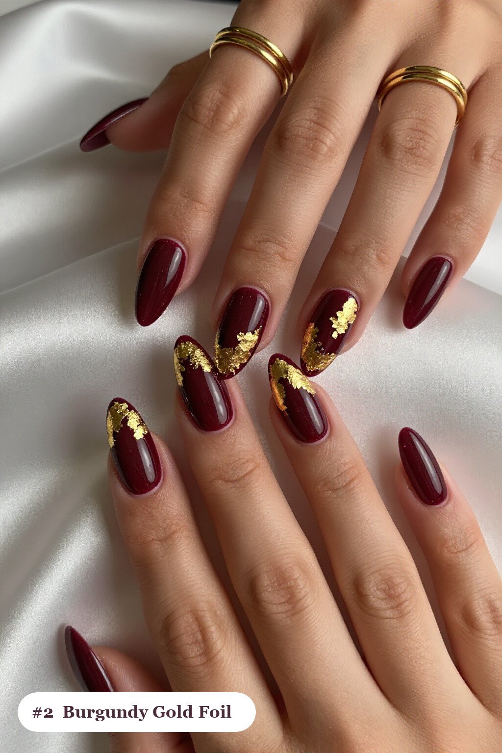 Burgundy Almond Nails with Gold Foil Flakes - long almond nails