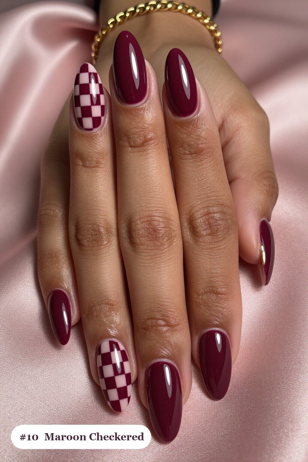 Long coffin maroon nails with a bold checkerboard pattern on two accent nails and solid colour on the rest, with gold details, perfect for fall - maroon fall nails Long coffin maroon nails with a bold checkerboard pattern on two accent nails and solid colour on the rest, with gold details, perfect for fall - maroon fall nails
