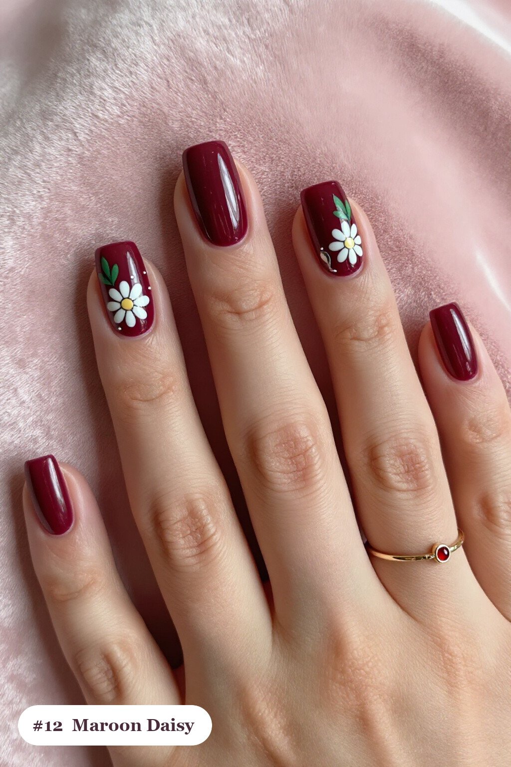 Medium square maroon nails with hand-painted daisies and green leaves across every nail, with silver chrome details, perfect for fall - maroon fall nails Medium square maroon nails with hand-painted daisies and green leaves across every nail, with silver chrome details, perfect for fall - maroon fall nails