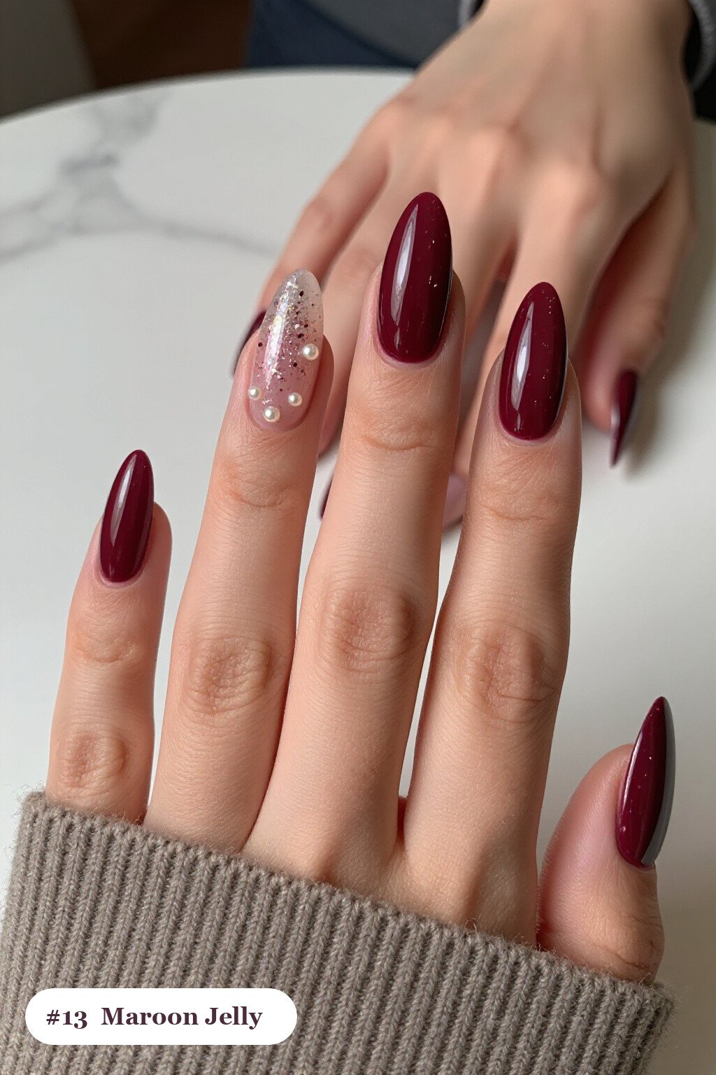 Long ballerina maroon nails in a see-through jelly finish with encapsulated glitter, with pearl details, perfect for fall - maroon fall nails Long ballerina maroon nails in a see-through jelly finish with encapsulated glitter, with pearl details, perfect for fall - maroon fall nails