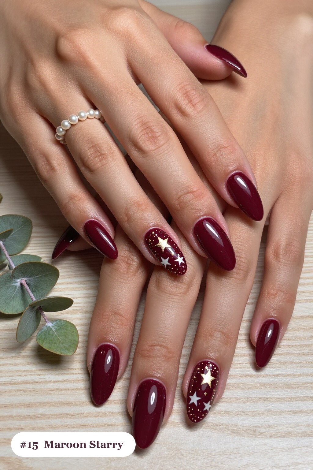 Long almond maroon nails with white and gold stars and sparkles painted on every nail, with rose gold details, perfect for fall - maroon fall nails Long almond maroon nails with white and gold stars and sparkles painted on every nail, with rose gold details, perfect for fall - maroon fall nails