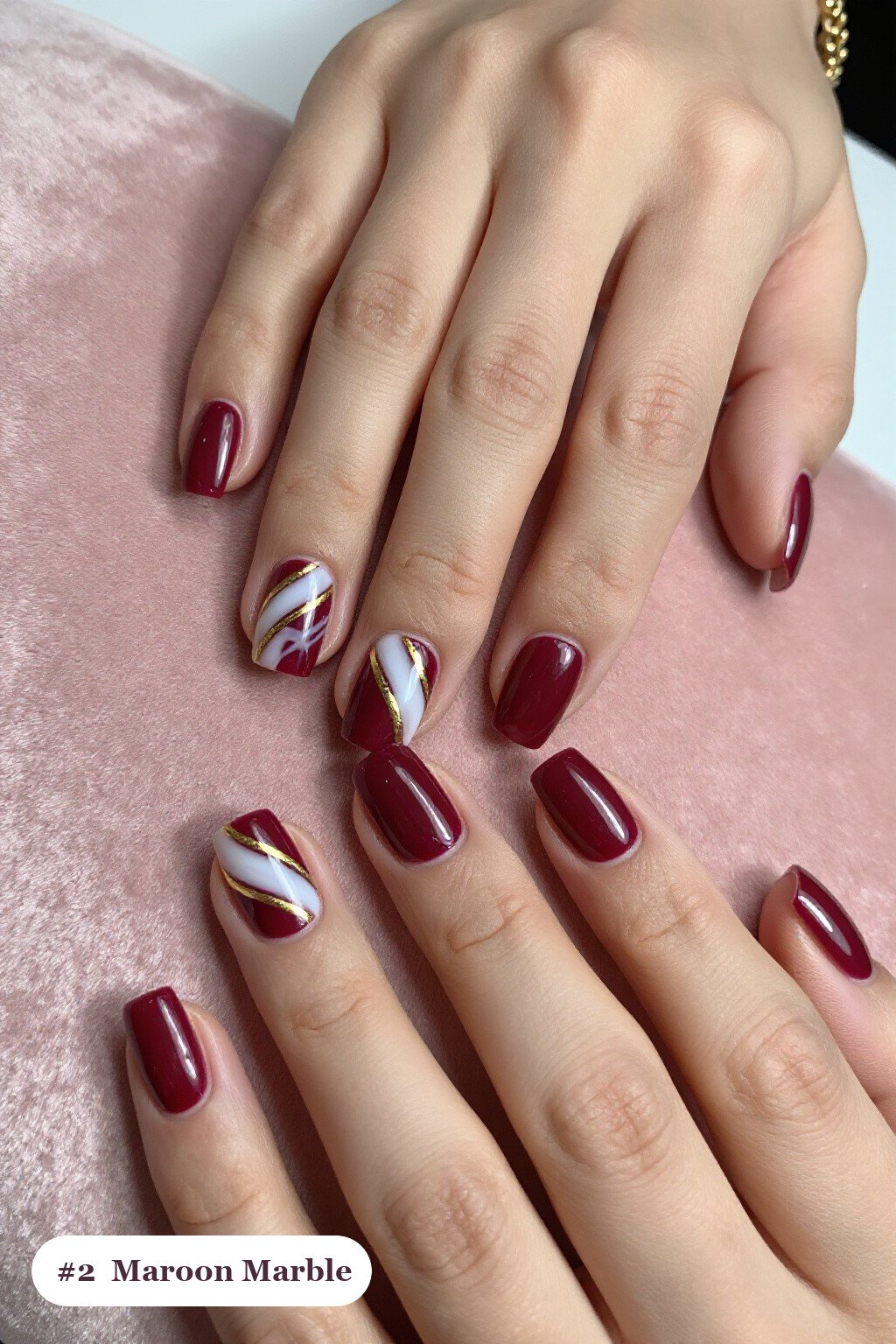 Medium square maroon nails with bold marble veins in white and gold across every nail, with gold details, perfect for fall - maroon fall nails Medium square maroon nails with bold marble veins in white and gold across every nail, with gold details, perfect for fall - maroon fall nails