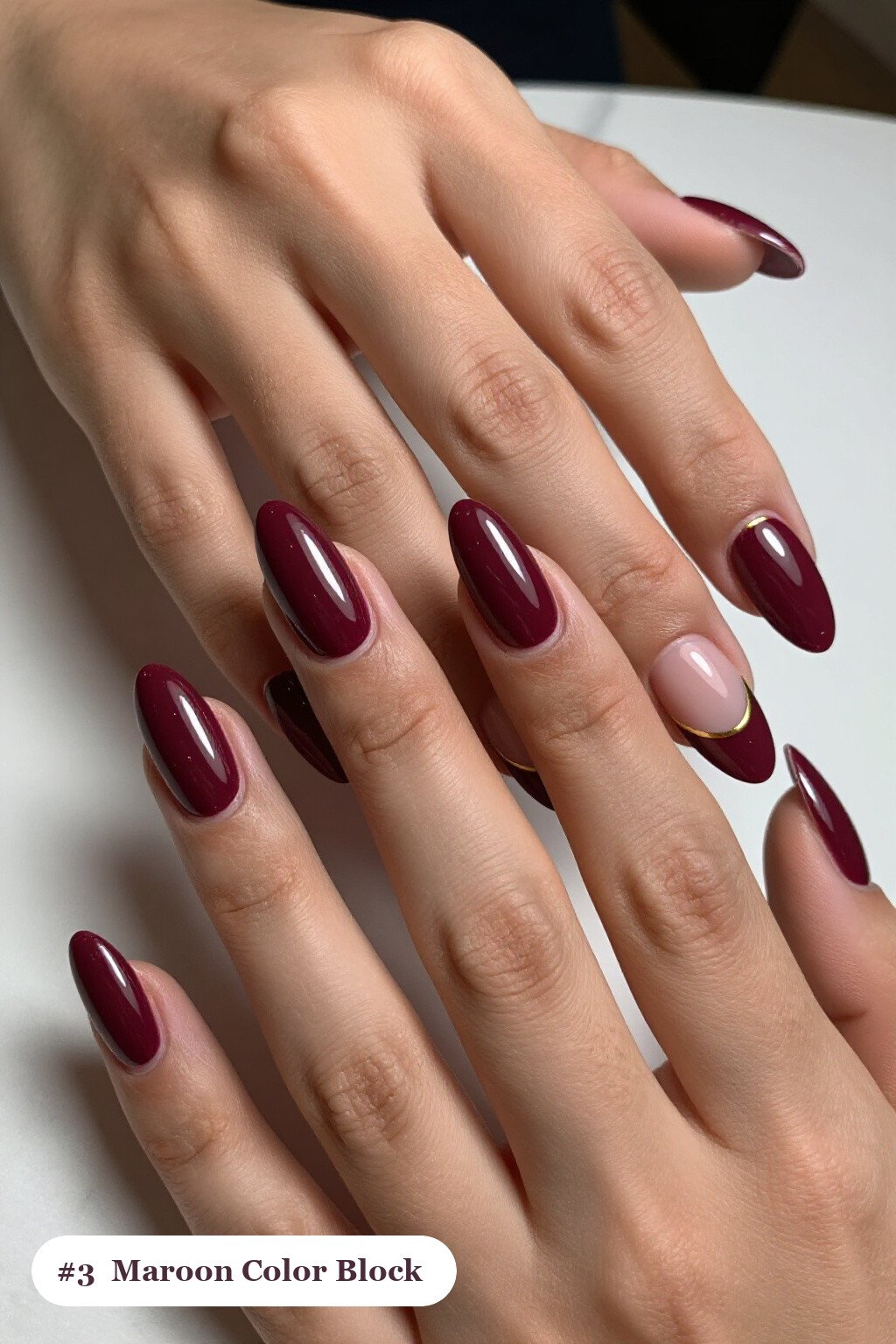 Long ballerina maroon nails in a colour-block design split diagonally with a thin gold line, with gold details, perfect for fall - maroon fall nails Long ballerina maroon nails in a colour-block design split diagonally with a thin gold line, with gold details, perfect for fall - maroon fall nails