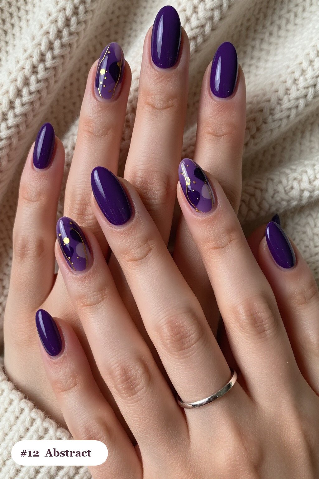Medium almond deep purple minimalist nails with abstract art of colour blobs, gold outlines and dots, perfect for halloween - minimalist halloween nails