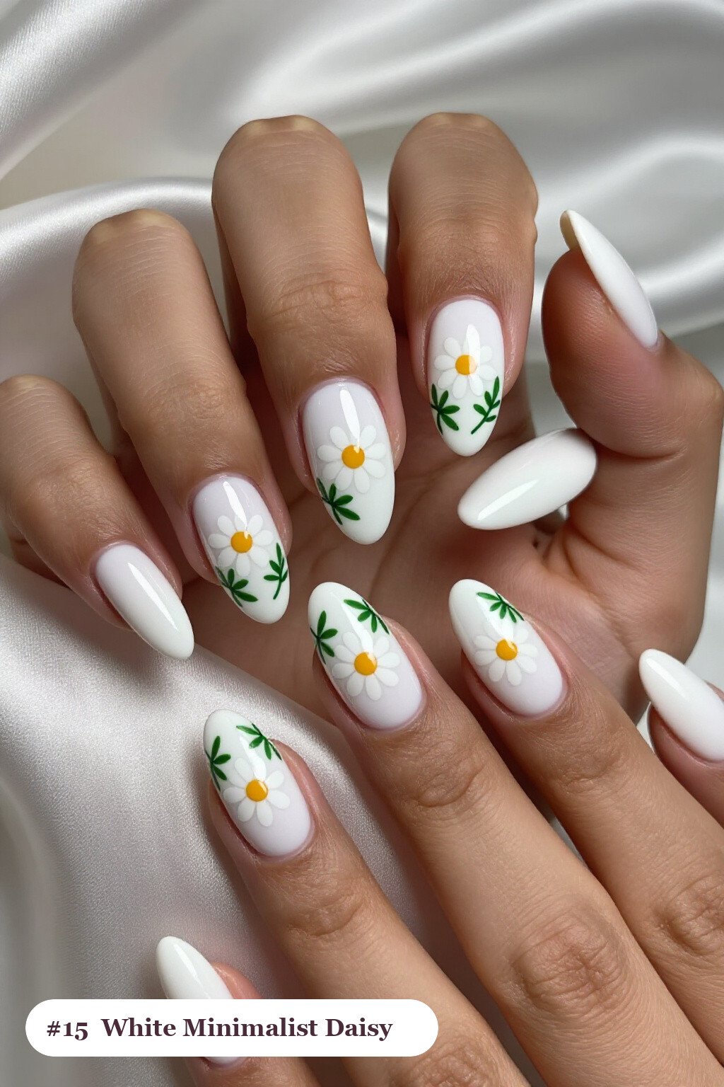 Long coffin bone white minimalist nails with hand-painted daisies and green leaves across every nail, perfect for halloween - minimalist halloween nails