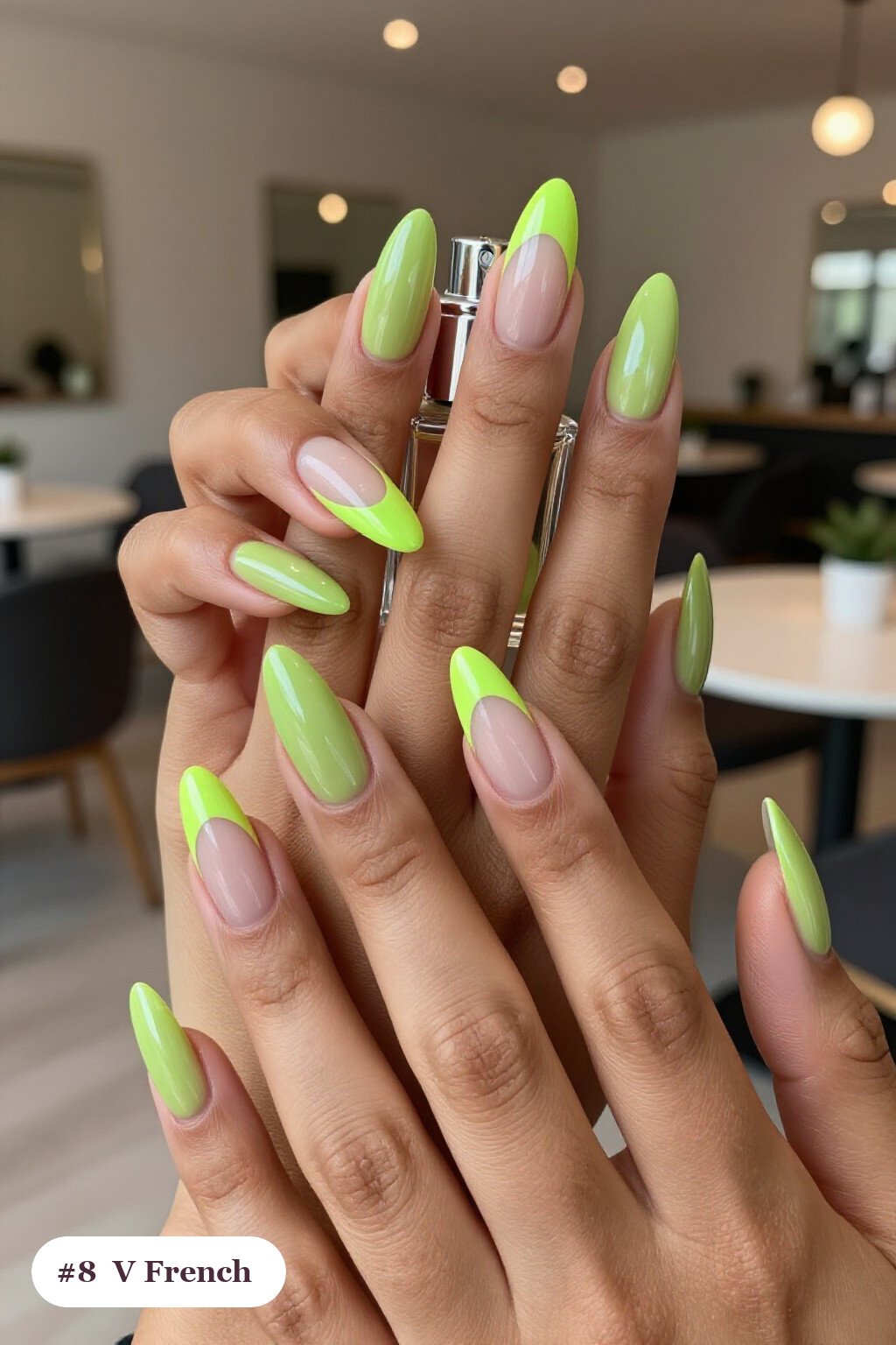 Long stiletto lime green minimalist nails with deep V-shaped french tips in a bold contrasting colour, perfect for halloween - minimalist halloween nails
