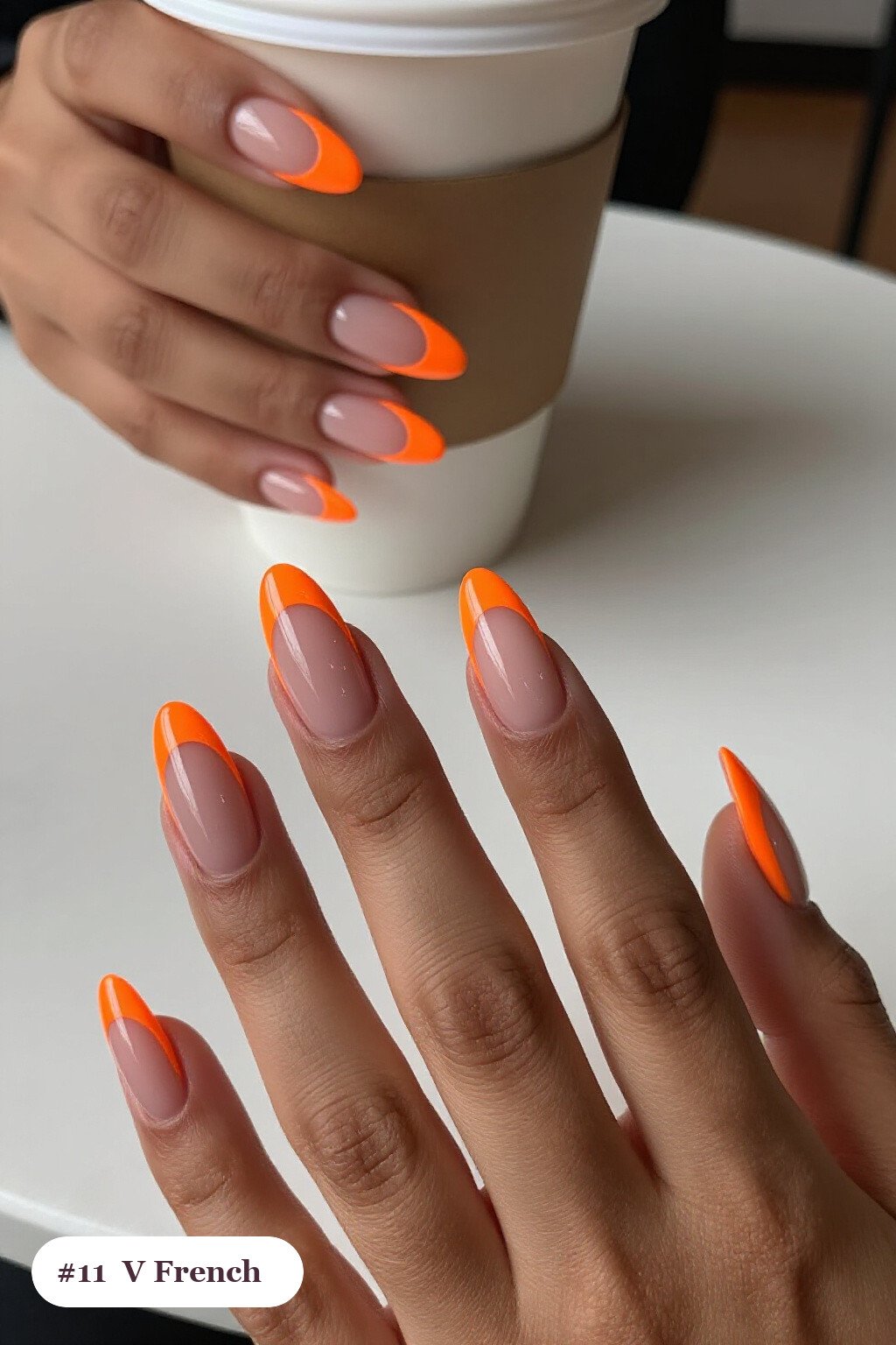 Long coffin orange october nails with deep V-shaped french tips in a bold contrasting colour, perfect for halloween - october halloween nail designs Long coffin orange october nails with deep V-shaped french tips in a bold contrasting colour, perfect for halloween - october halloween nail designs