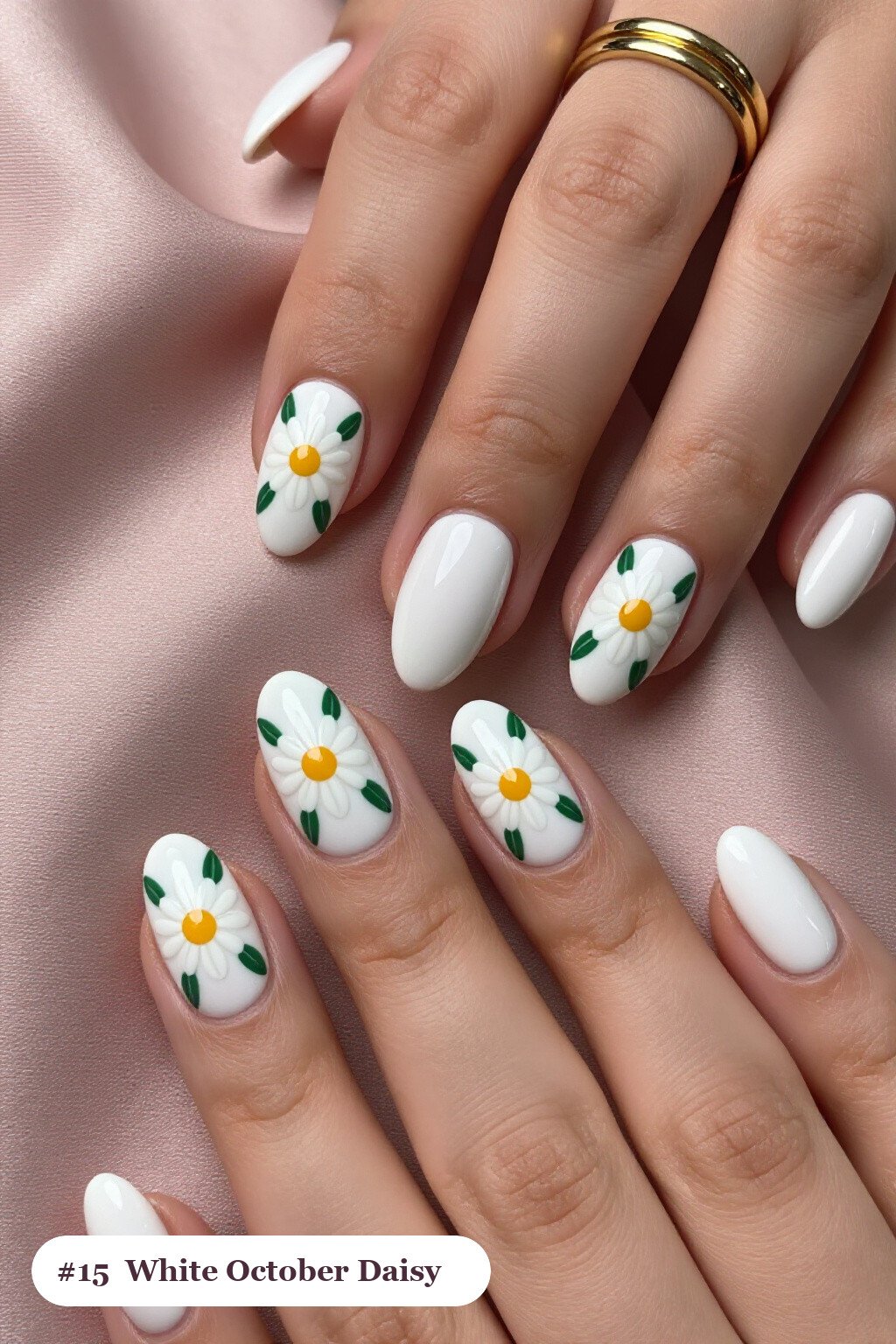 Medium oval bone white october nails with hand-painted daisies and green leaves across every nail, perfect for halloween - october halloween nail designs Medium oval bone white october nails with hand-painted daisies and green leaves across every nail, perfect for halloween - october halloween nail designs