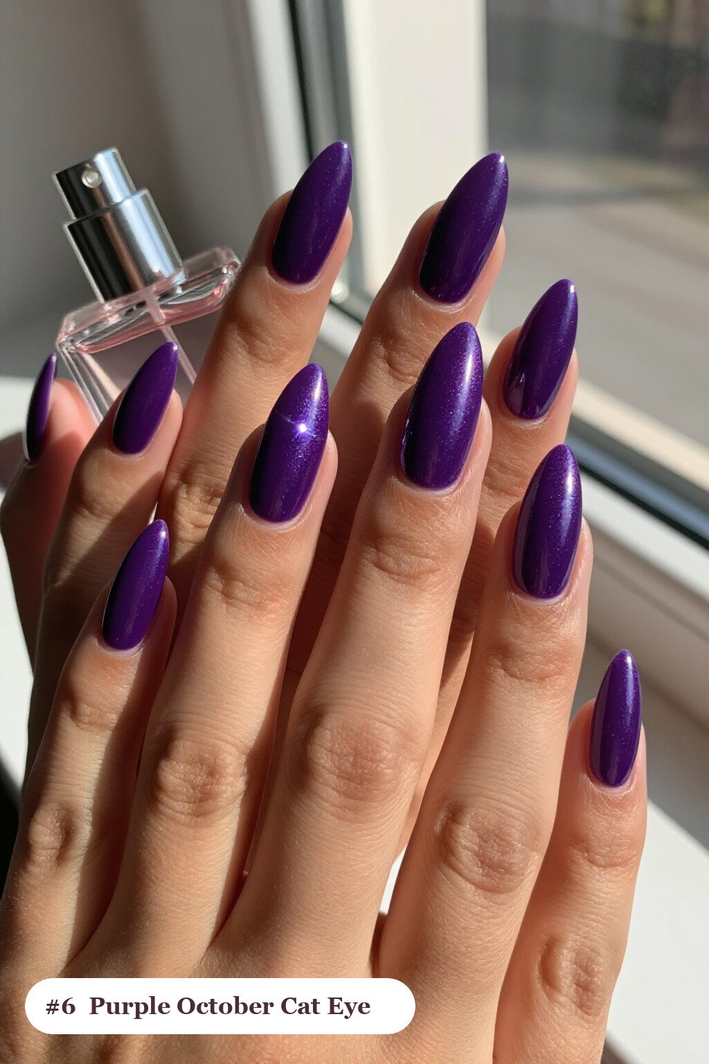 Long stiletto deep purple october nails with a glowing shimmer band of light running down the centre of each nail like a gemstone, perfect for halloween - october halloween nail designs Long stiletto deep purple october nails with a glowing shimmer band of light running down the centre of each nail like a gemstone, perfect for halloween - october halloween nail designs