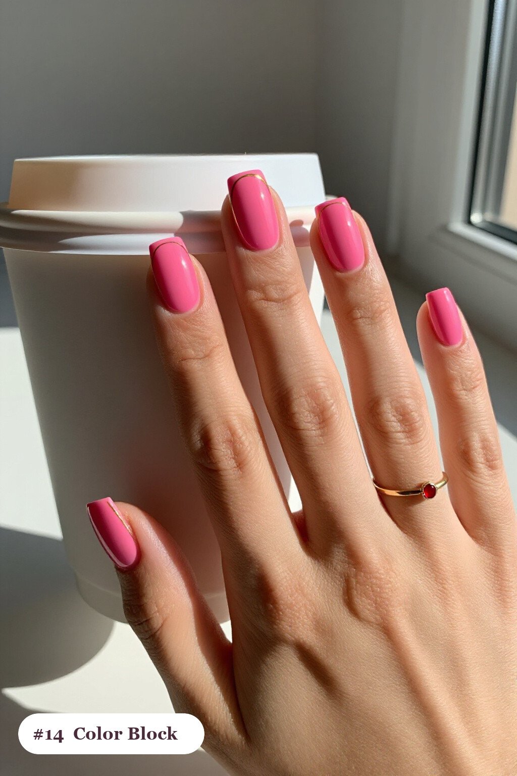 Short square hot pink october nails in a colour-block design split diagonally with a thin gold line - october nail ideas Short square hot pink october nails in a colour-block design split diagonally with a thin gold line - october nail ideas