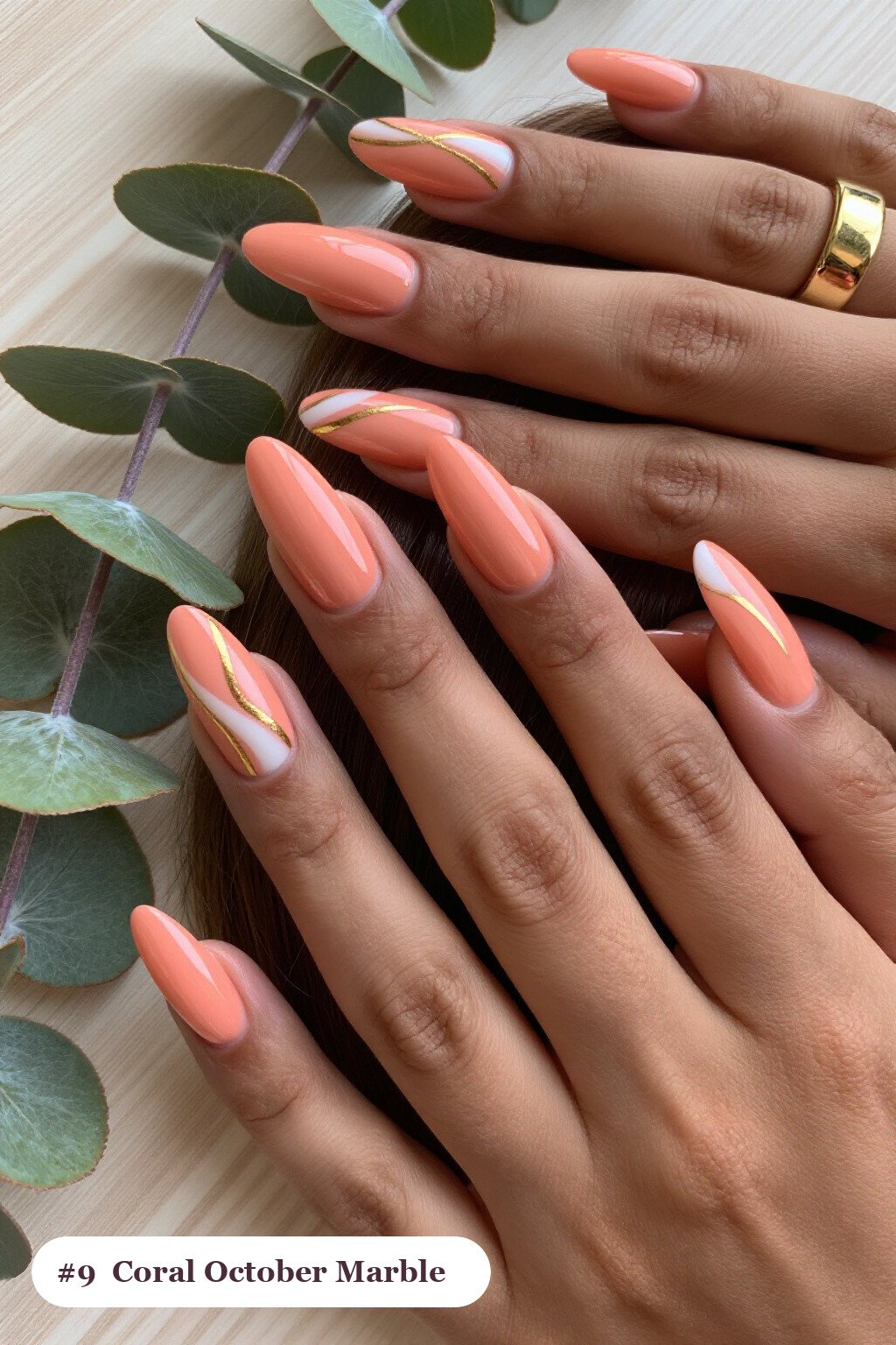Long ballerina coral october nails with bold marble veins in white and gold across every nail - october nail ideas Long ballerina coral october nails with bold marble veins in white and gold across every nail - october nail ideas