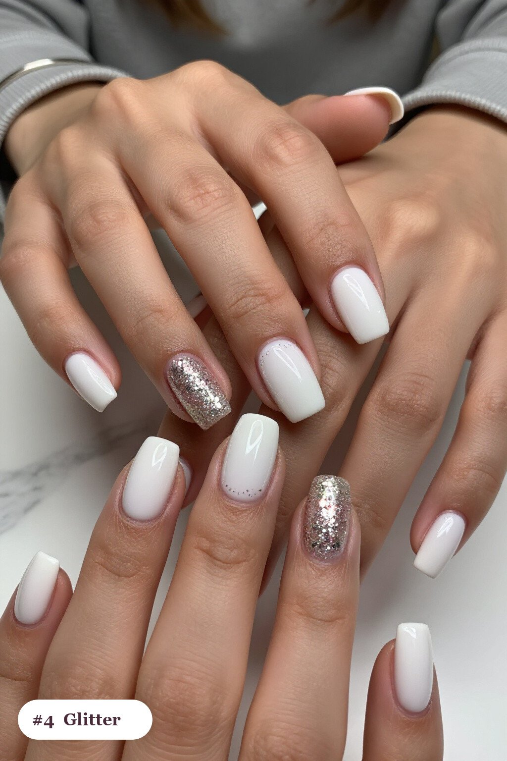 Medium square milky white october november nails with a sparkling glitter gradient rising from the cuticle - october november nail designs