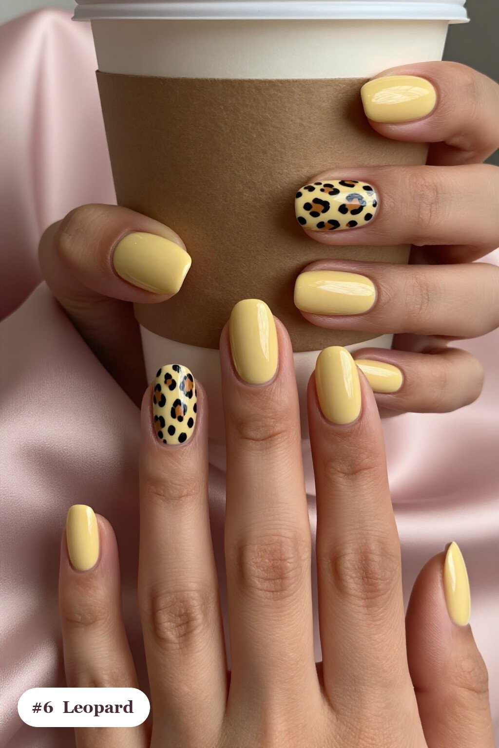 Medium oval butter yellow october november nails with a leopard print pattern on two accent nails and solid colour on the rest - october november nail designs