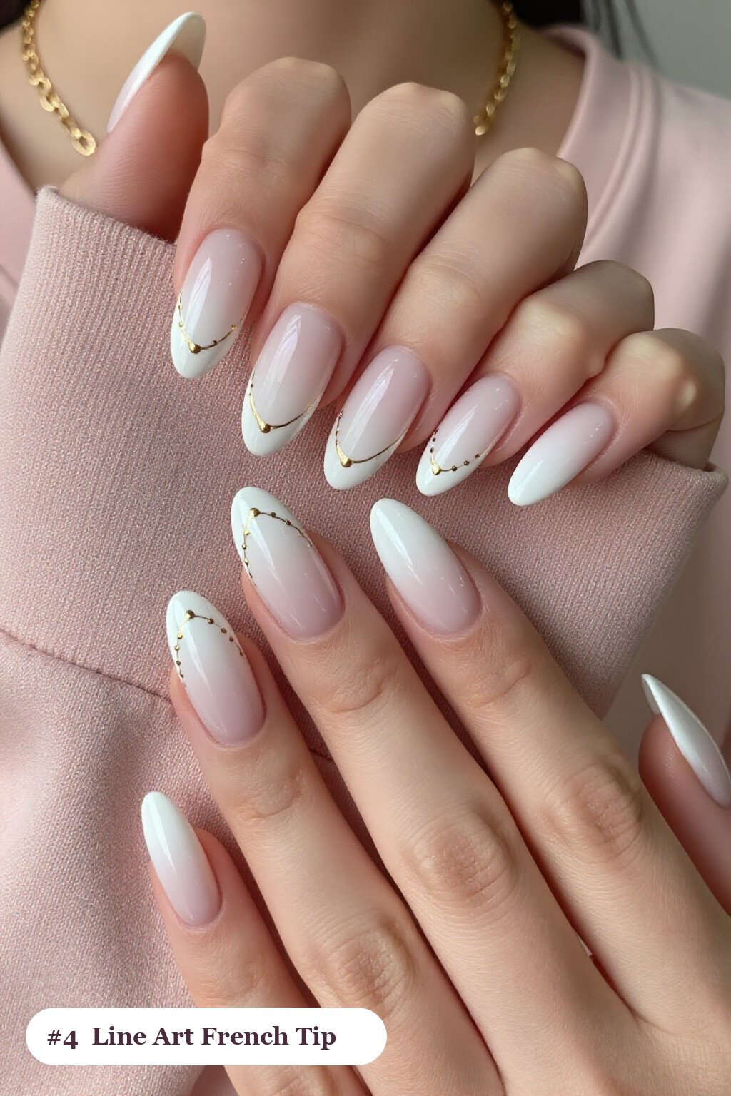 Medium almond milky white ombre french nails with crisp french tips and a smooth ombre gradient clearly visible on every nail, styled with fine gold line art and tiny dots drawn across every nail - ombre french almond nails