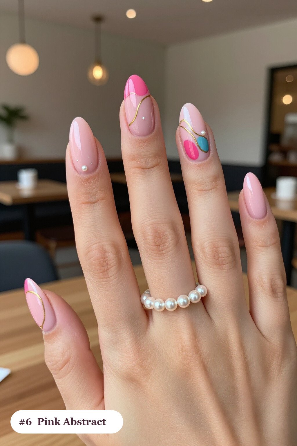 Abstract Colour‑Blob Art on Medium Almond Pink Nails with Pearl Details - pink almond nails