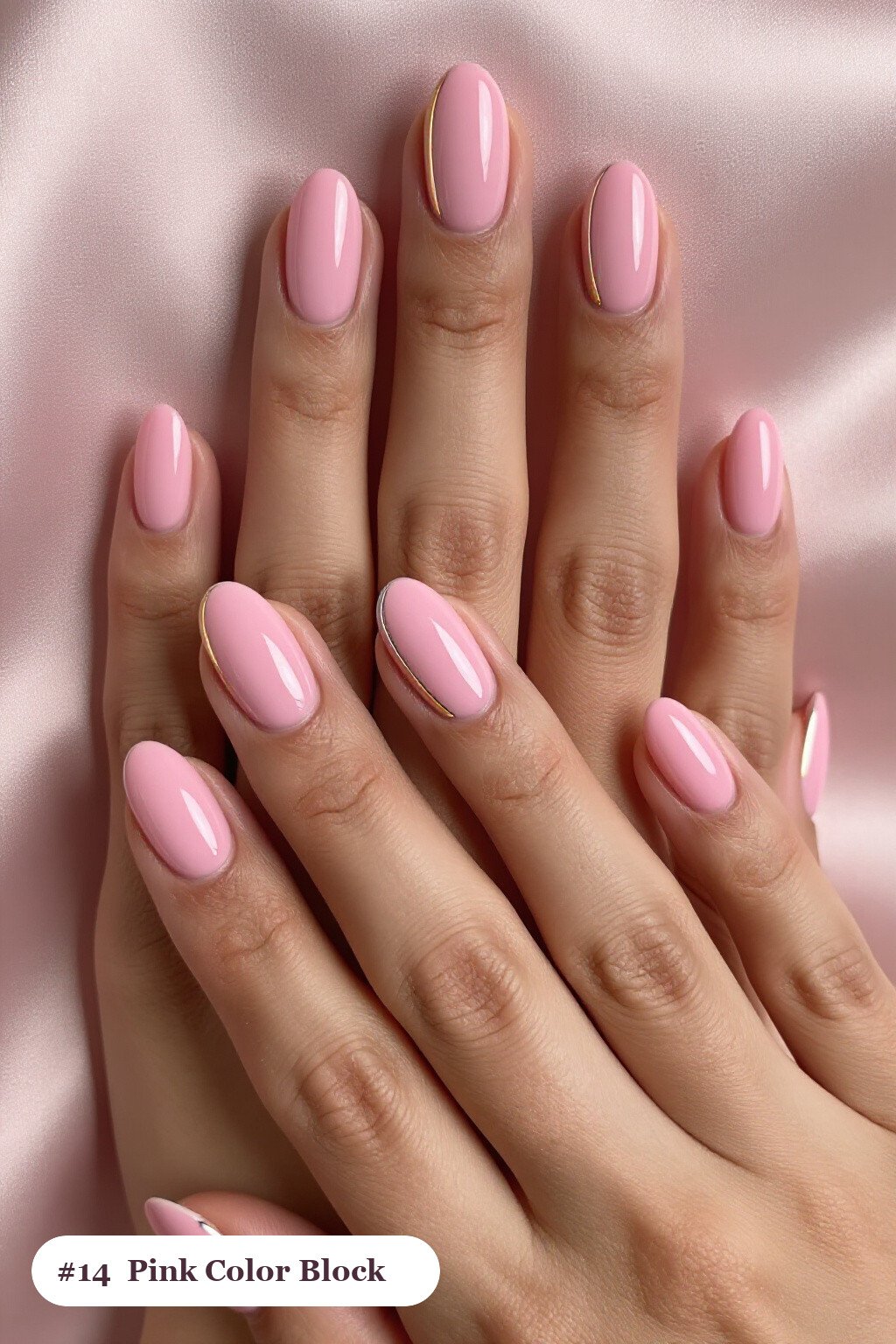 Medium oval pink nails in a colour-block design split diagonally with a thin gold line, with silver details - pink nails Medium oval pink nails in a colour-block design split diagonally with a thin gold line, with silver details - pink nails