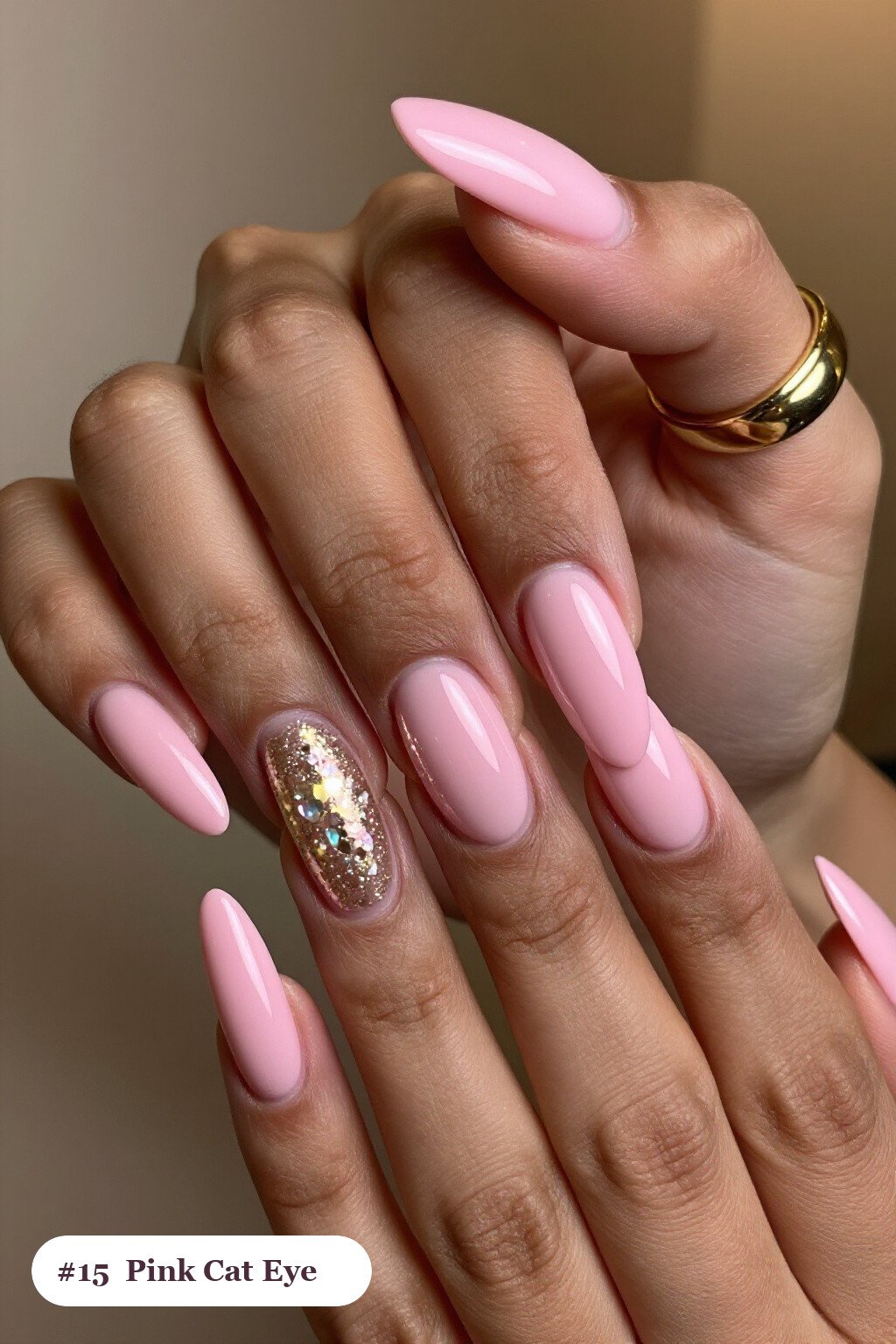 Long coffin pink nails with a glowing shimmer band of light running down the centre of each nail like a gemstone, with champagne details - pink nails Long coffin pink nails with a glowing shimmer band of light running down the centre of each nail like a gemstone, with champagne details - pink nails