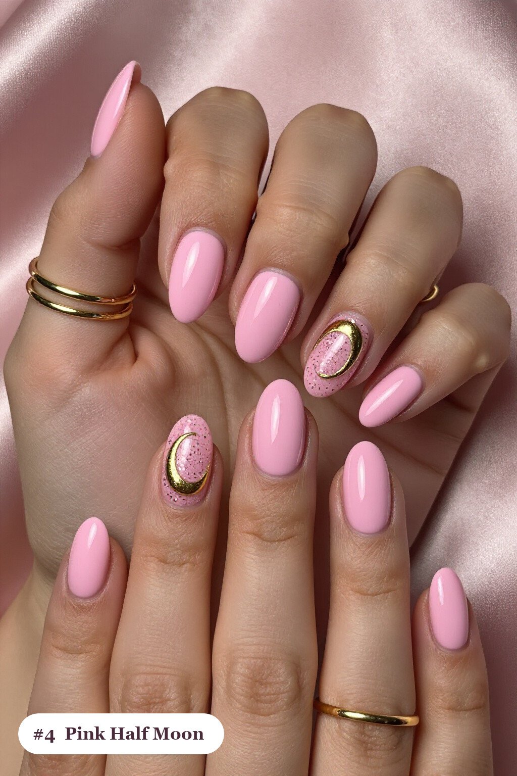 Medium oval pink nails in a half-moon design with a glitter crescent at the cuticle, with gold details - pink nails Medium oval pink nails in a half-moon design with a glitter crescent at the cuticle, with gold details - pink nails
