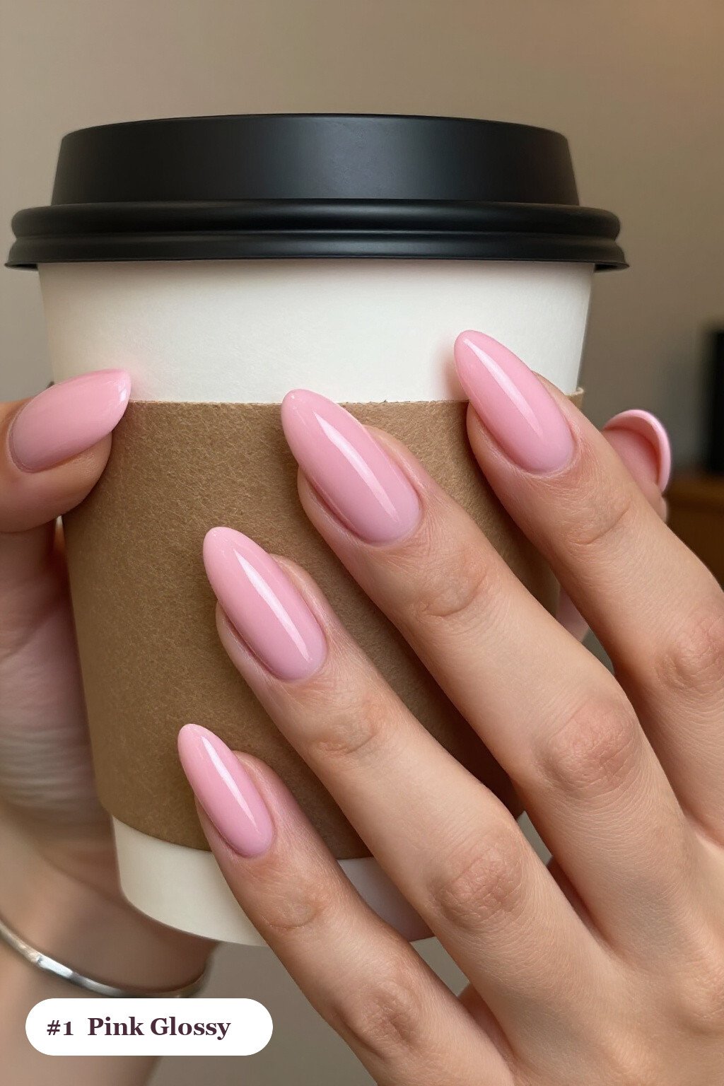 Medium almond pink nails in a flawless mirror-glossy full-colour finish - pink nails almond