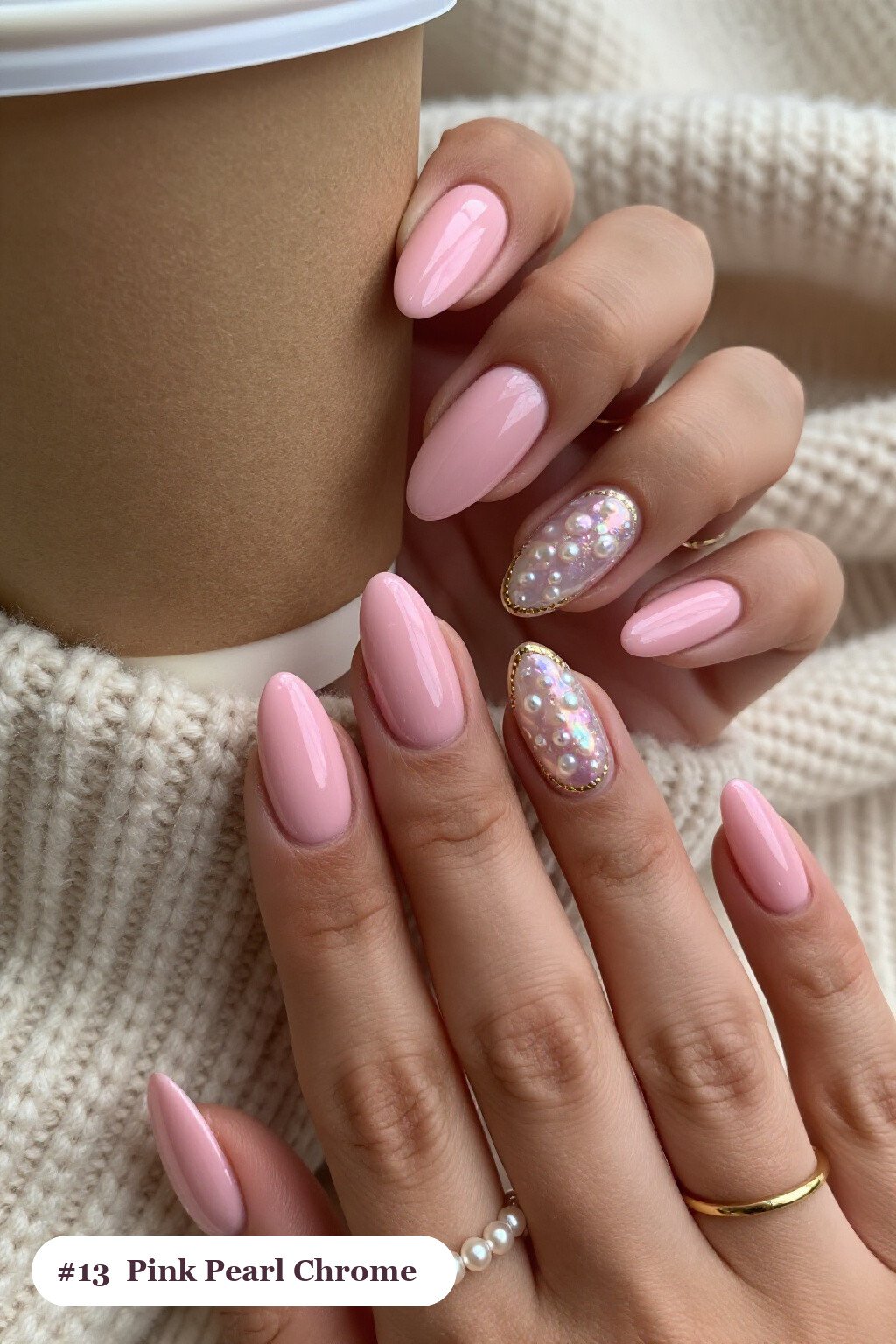Medium almond pink nails with glazed pearl chrome over the colour for an iridescent sheen, with gold details - pink nails almond